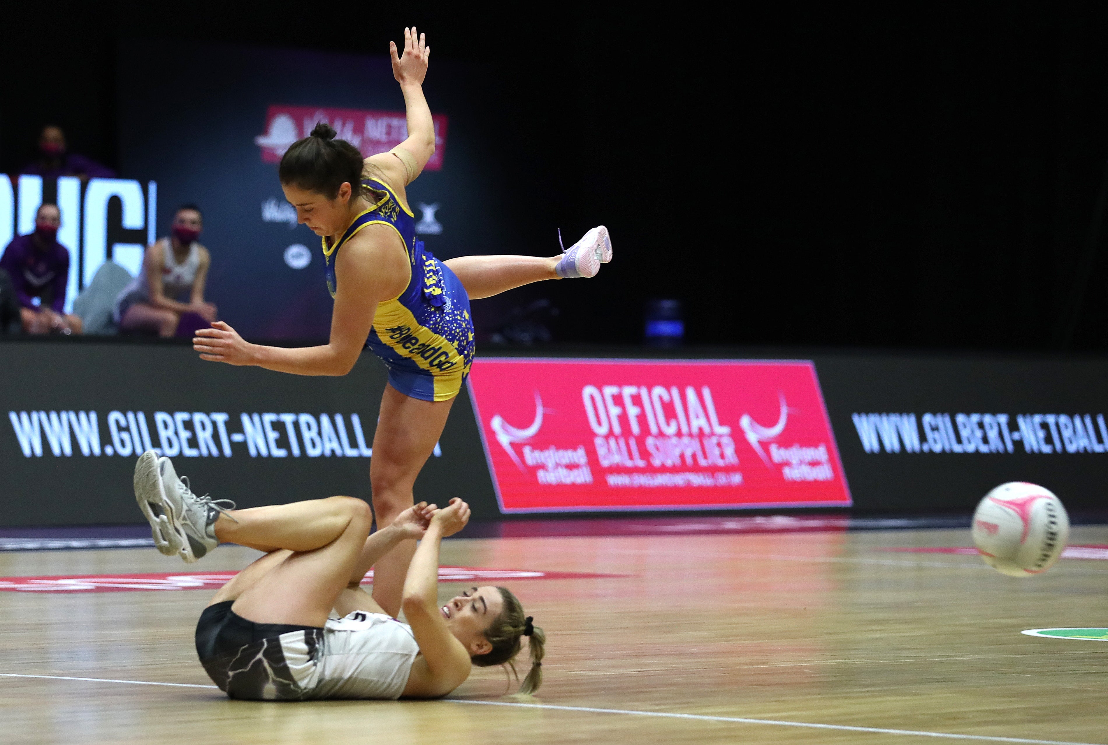 Natalie Panagarry of Loughborough Lightning is floored by Rachel Shaw of Team Bath