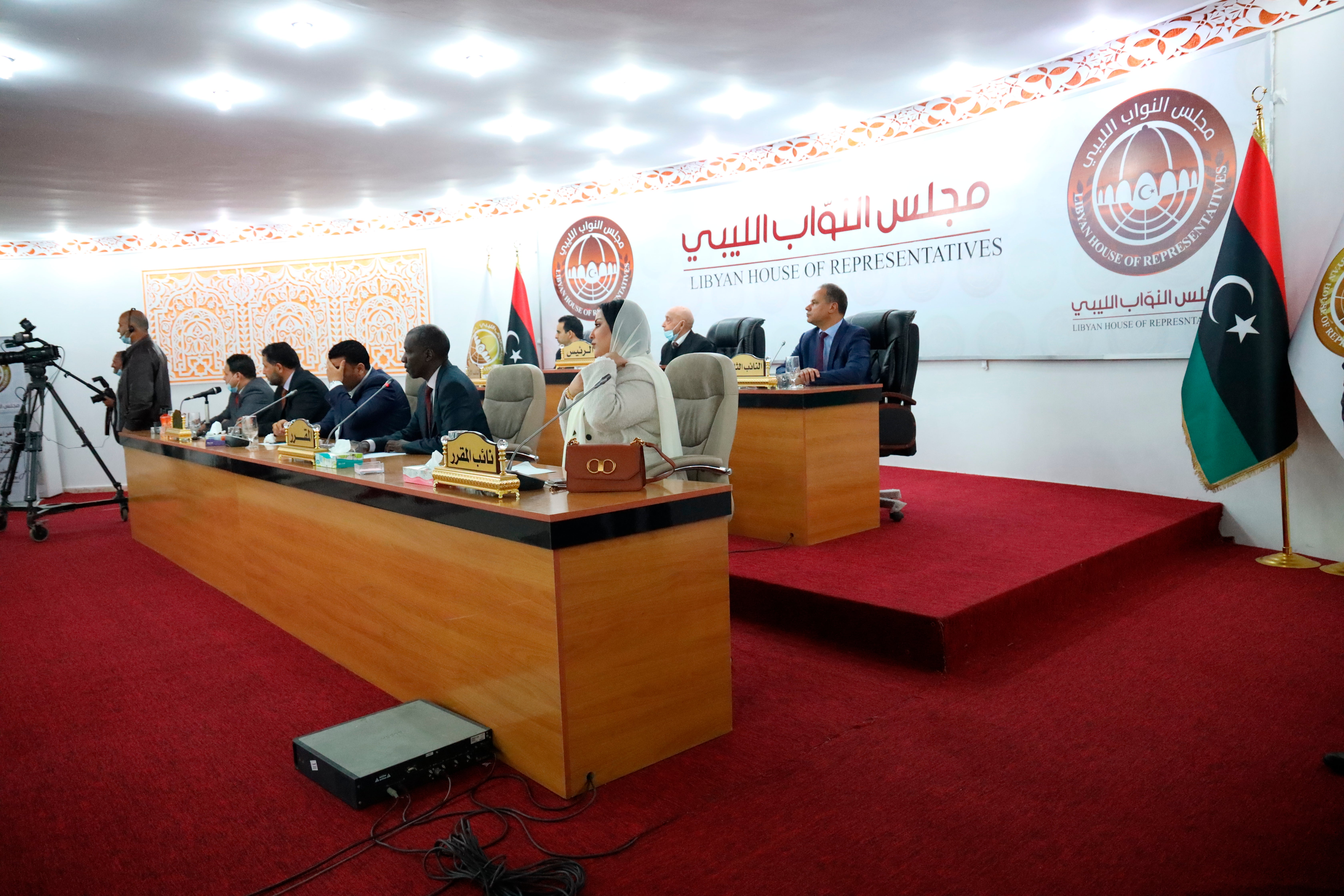 Leaders of Libya's parliament, headed by speaker Aguila Saleh, preside over the swearing-in ceremony for the country’s new interim government in Tobruk