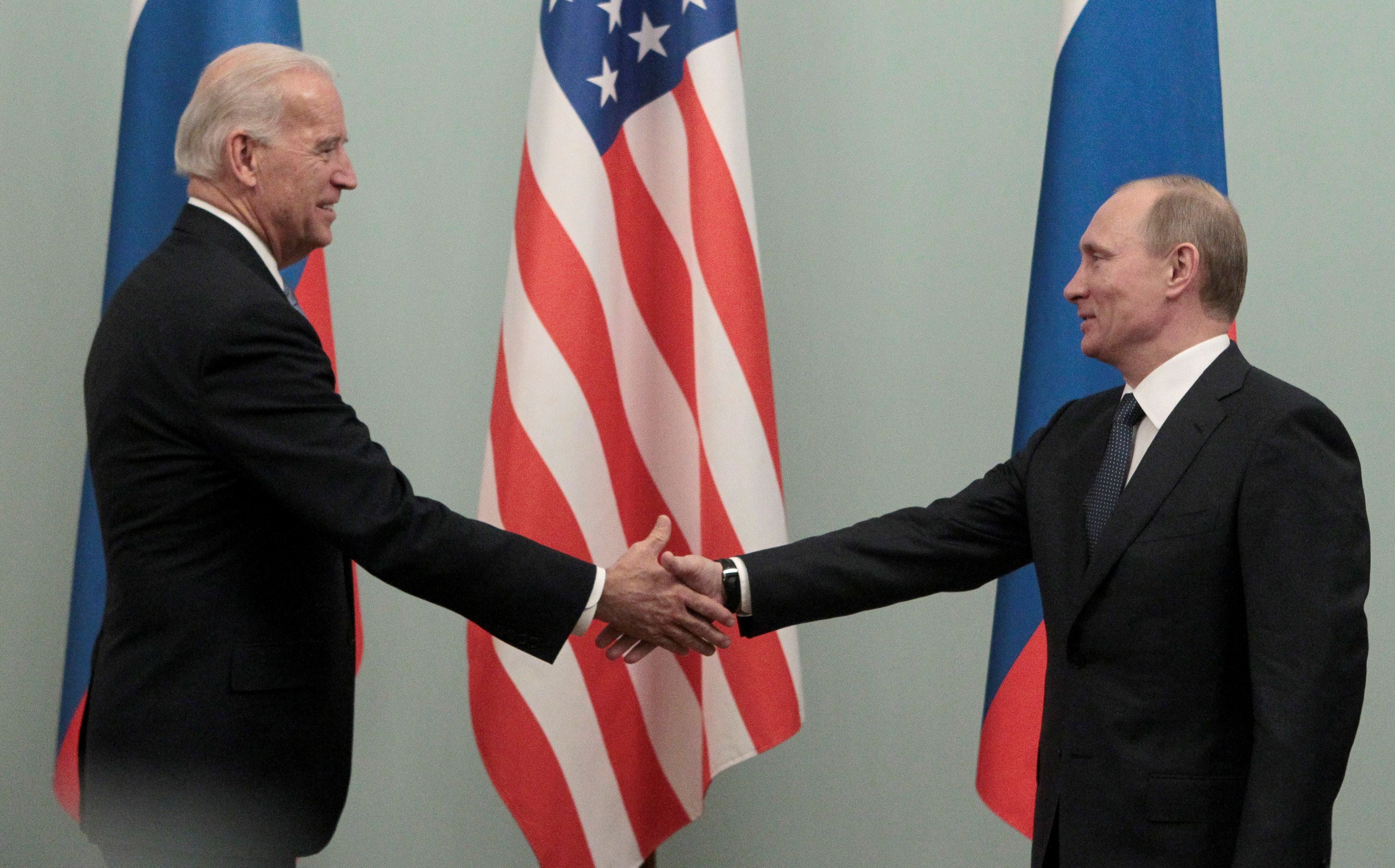 Joe Biden meets Russian Prime Minister Vladimir Putin in 2011