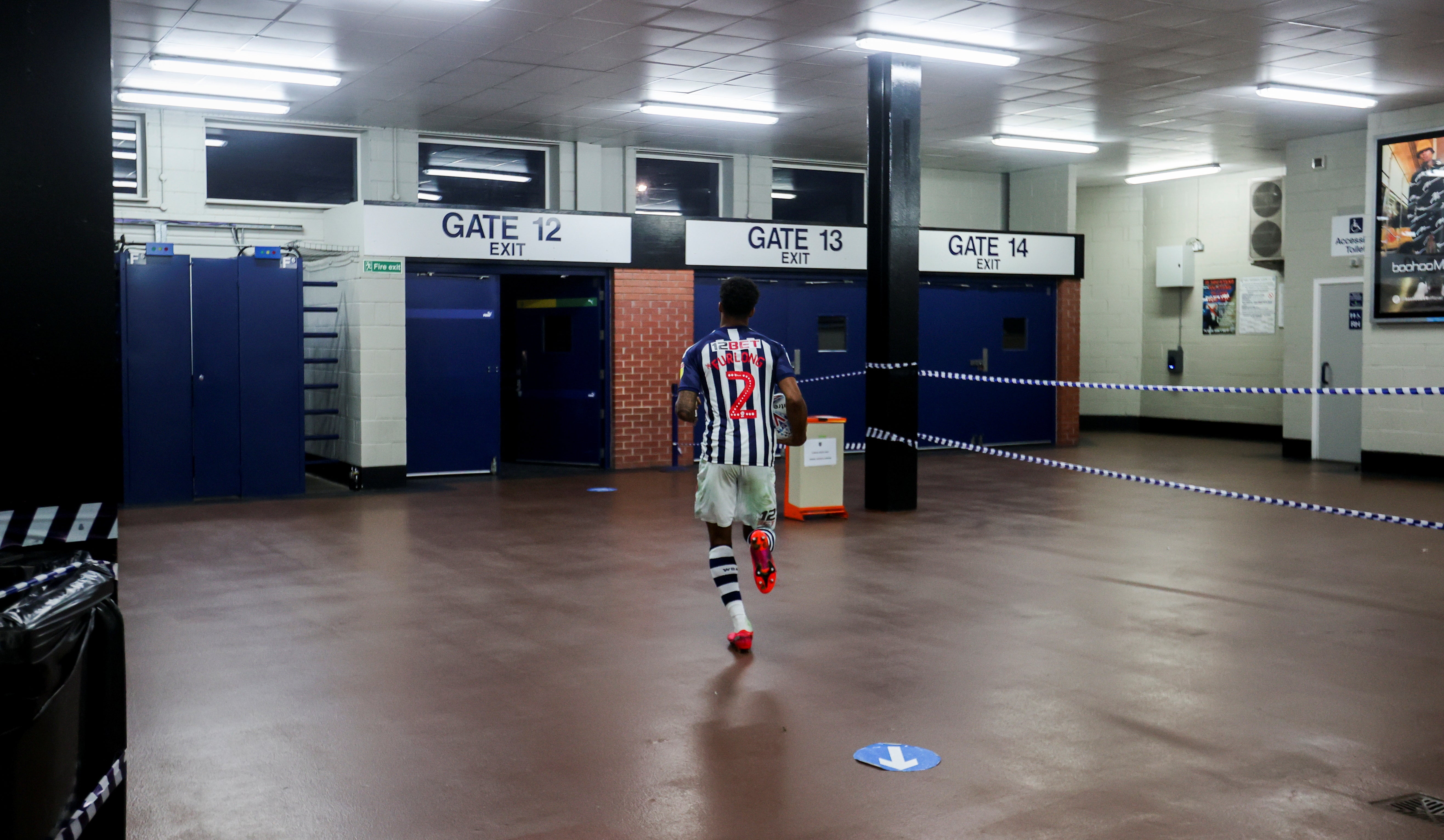 Darnell Furlong runs out of the stadium to the car park to celebrate West Brom’s promotion to the Premier League with the fans who had gathered there after they beat Queens Park Rangers in The Hawthorns last July