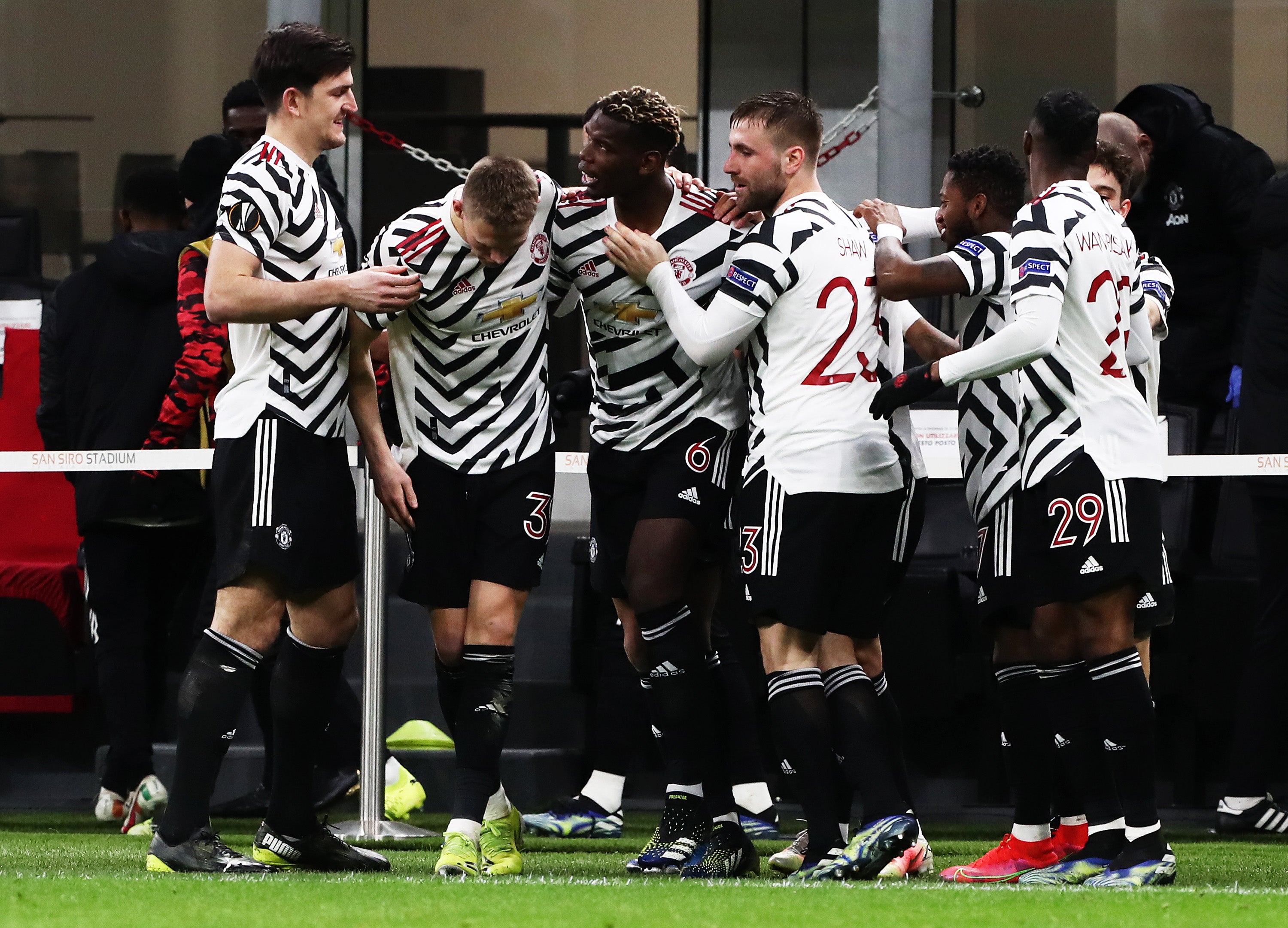 United celebrate Paul Pogba’s winning goal in Milan