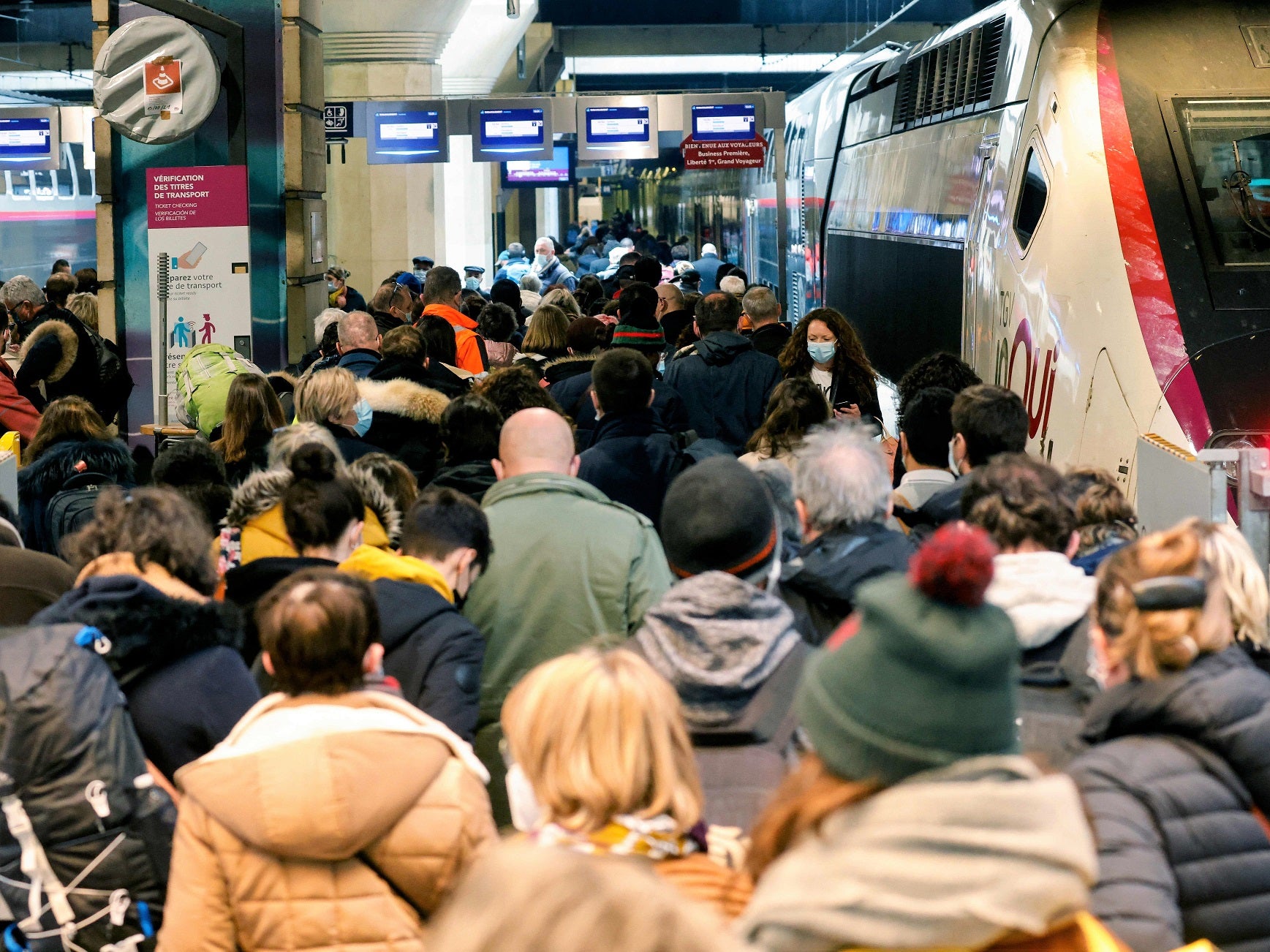 There were long lines at major railway stations to board fully-booked trains