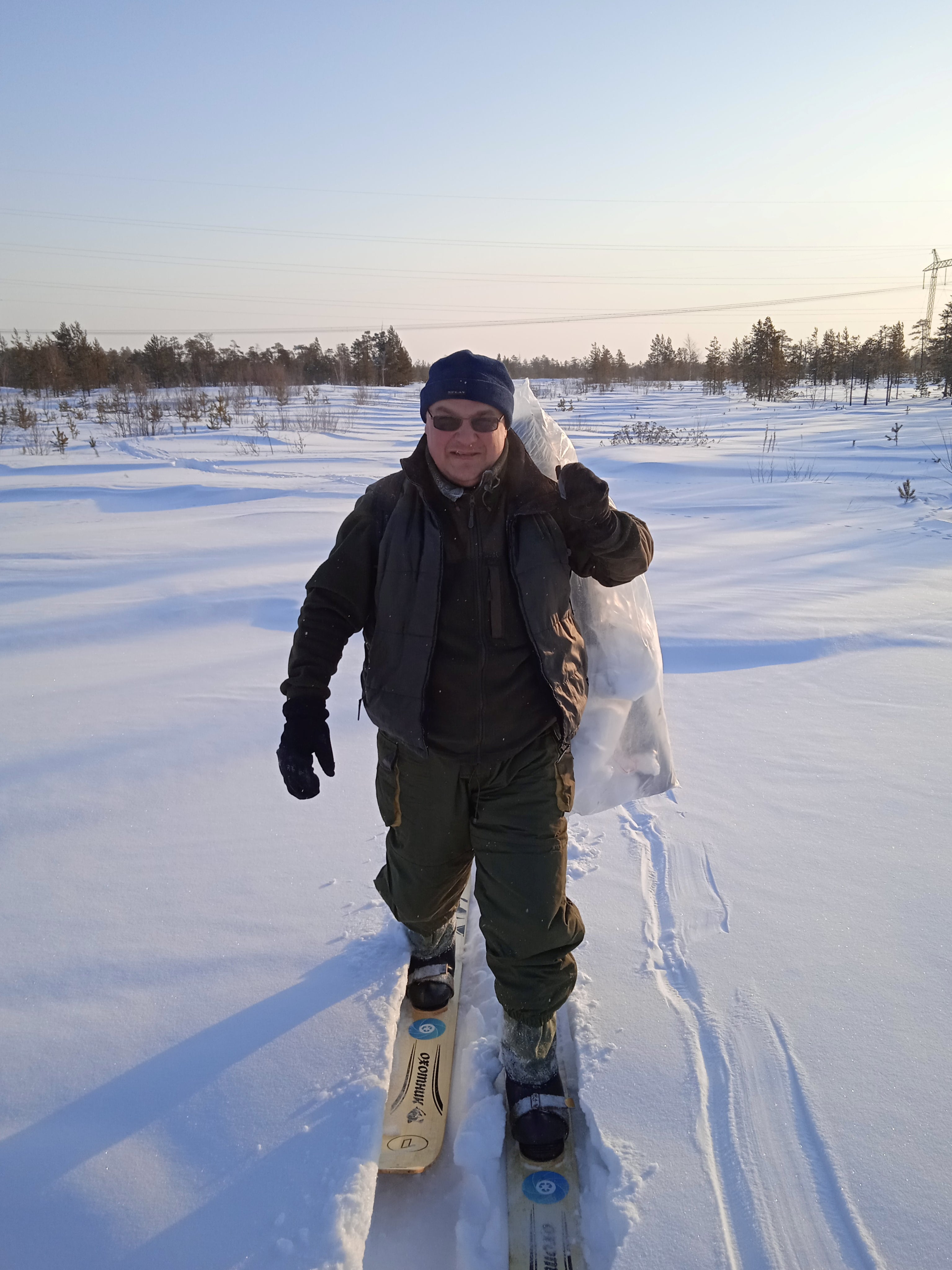 Danil Vorobyov, of Tomsk State University, collects snow samples