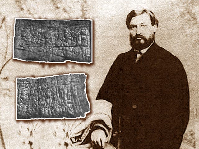 <p>Moses Wilhelm Shapira with two fragments of the <em>Scrolls</em></p>