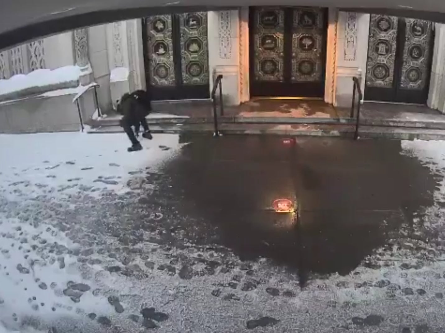 CCTV footage shows a suspect draw a swastika in front of a Jewish temple in New York City in February