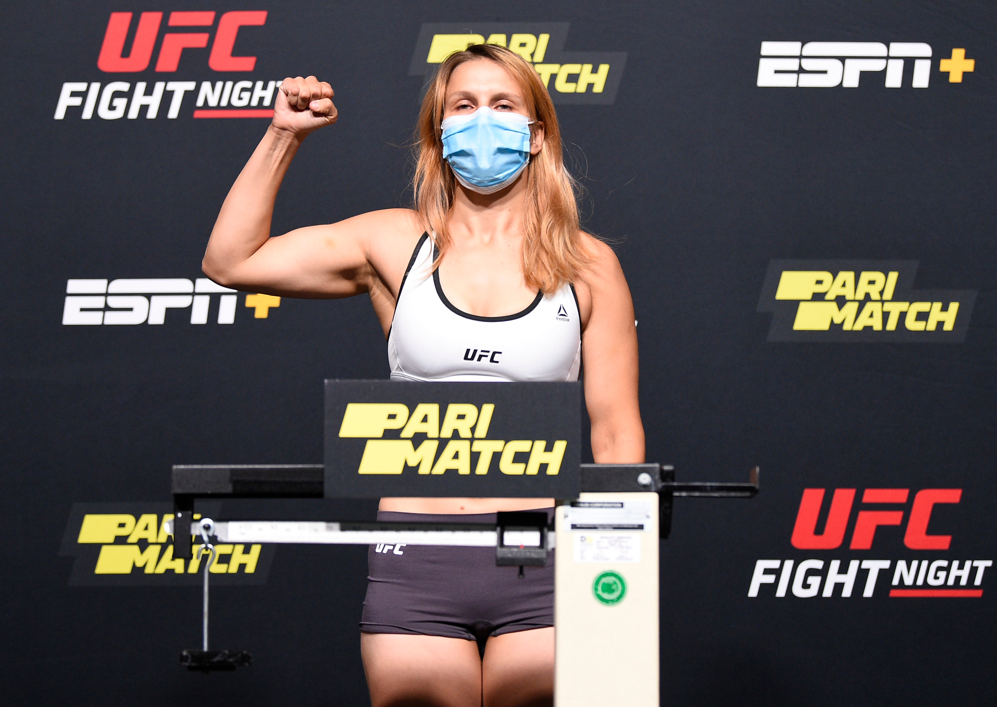 Julija Stoliarenko on the weigh-in scales