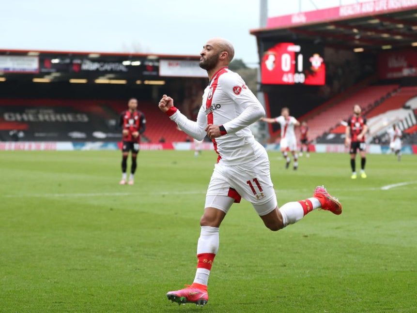 Saints forward celebrates scoring his side’s secnd