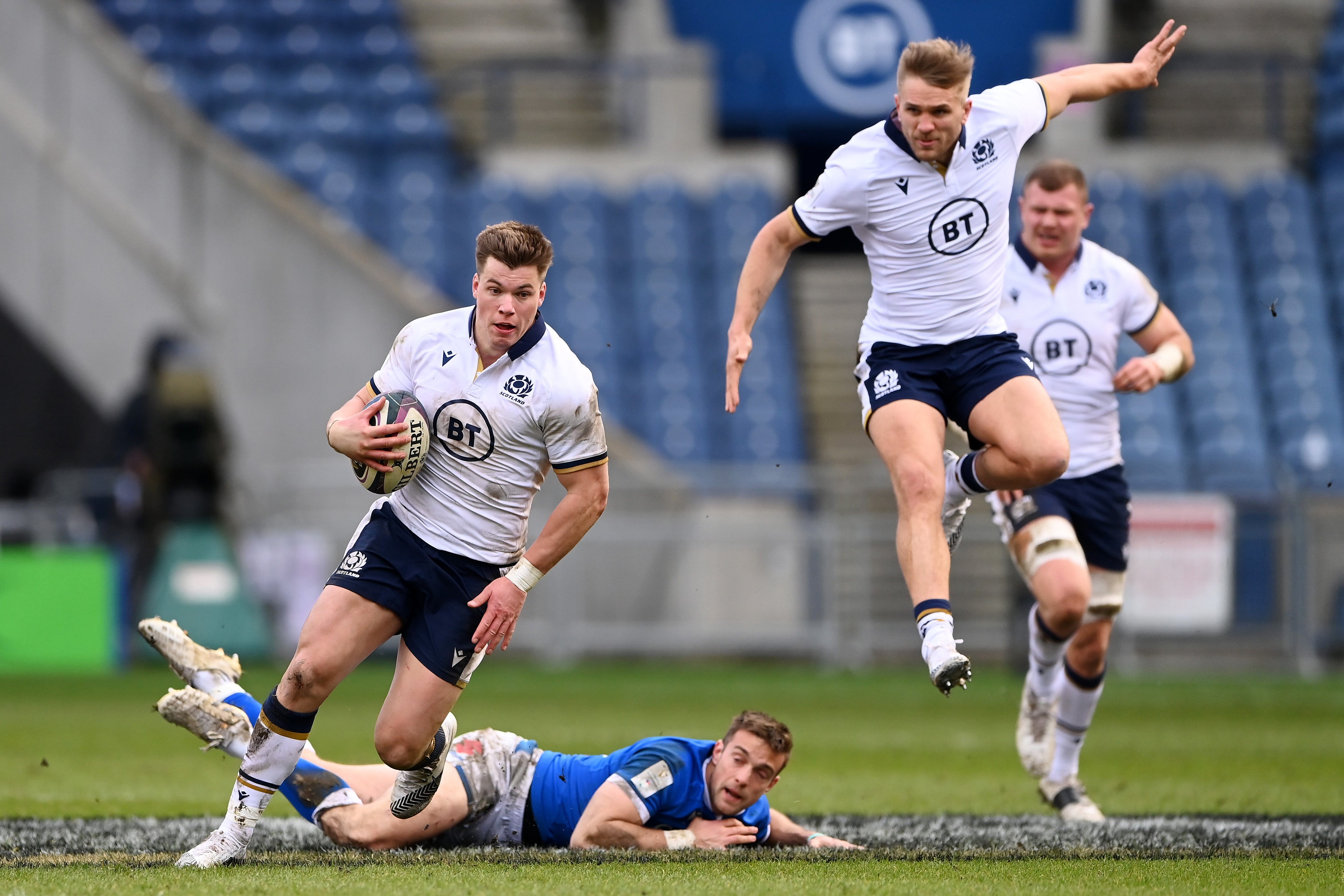 Huw Jones makes a break with Chris Harris in support