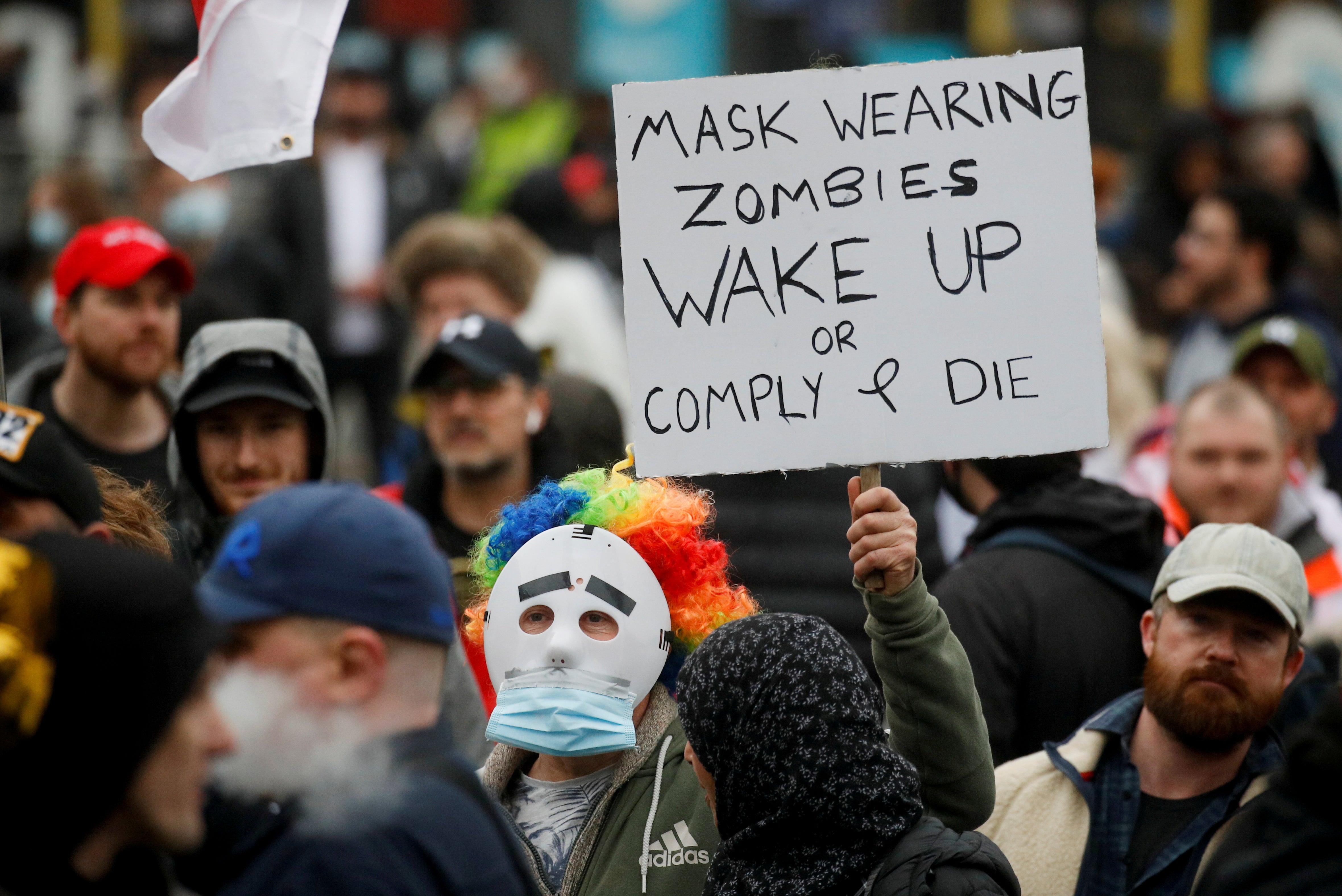 People march in a protest against the lockdown in Manchester on Saturday