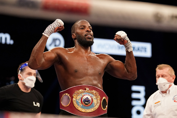 Lawerence Okolie celebrates beating Krzysztof Glowacki for the WBO crusierweight world title