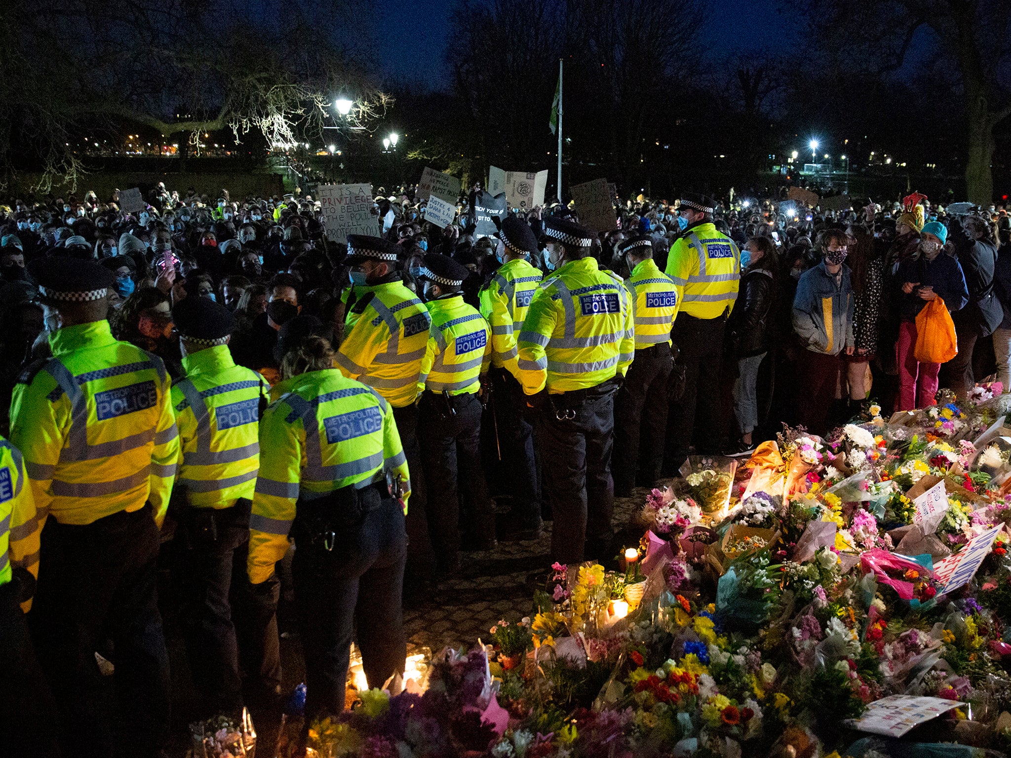 People attend a vigil for Sarah Everard in Clapham this month