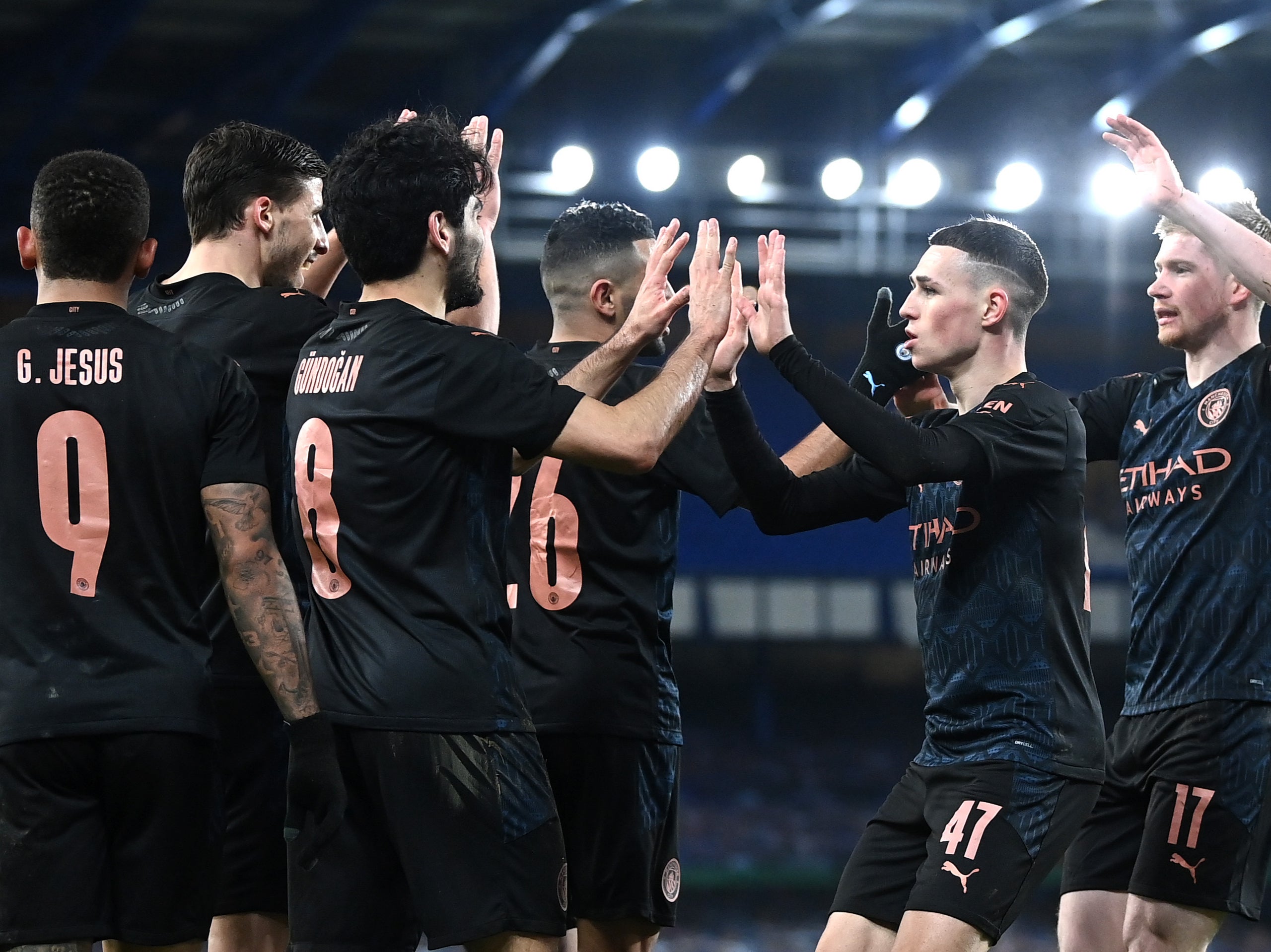 Manchester City players celebrate during their FA Cup win over Everton