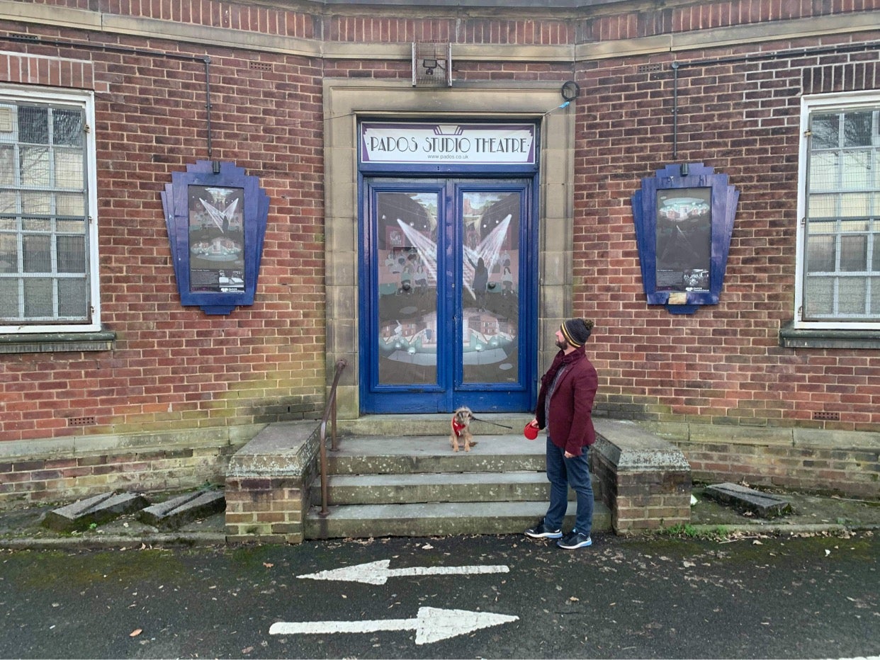 Glen Clancy, a member of Pados, with dog Lola outside Prestwich Studio Theatre