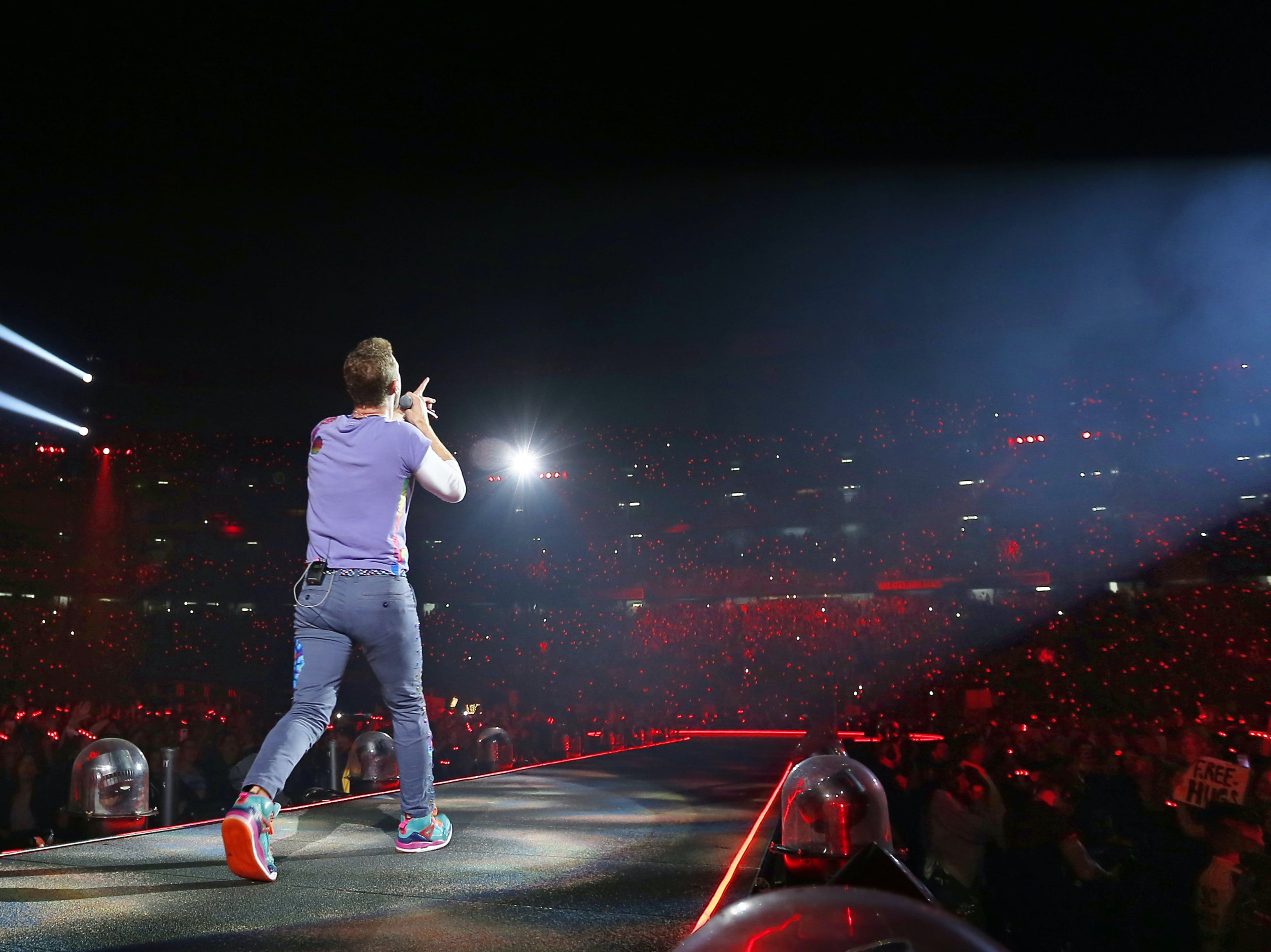 ‘Where did the world go?’ Chris Martin performing with Coldplay at a stadium in San Diego