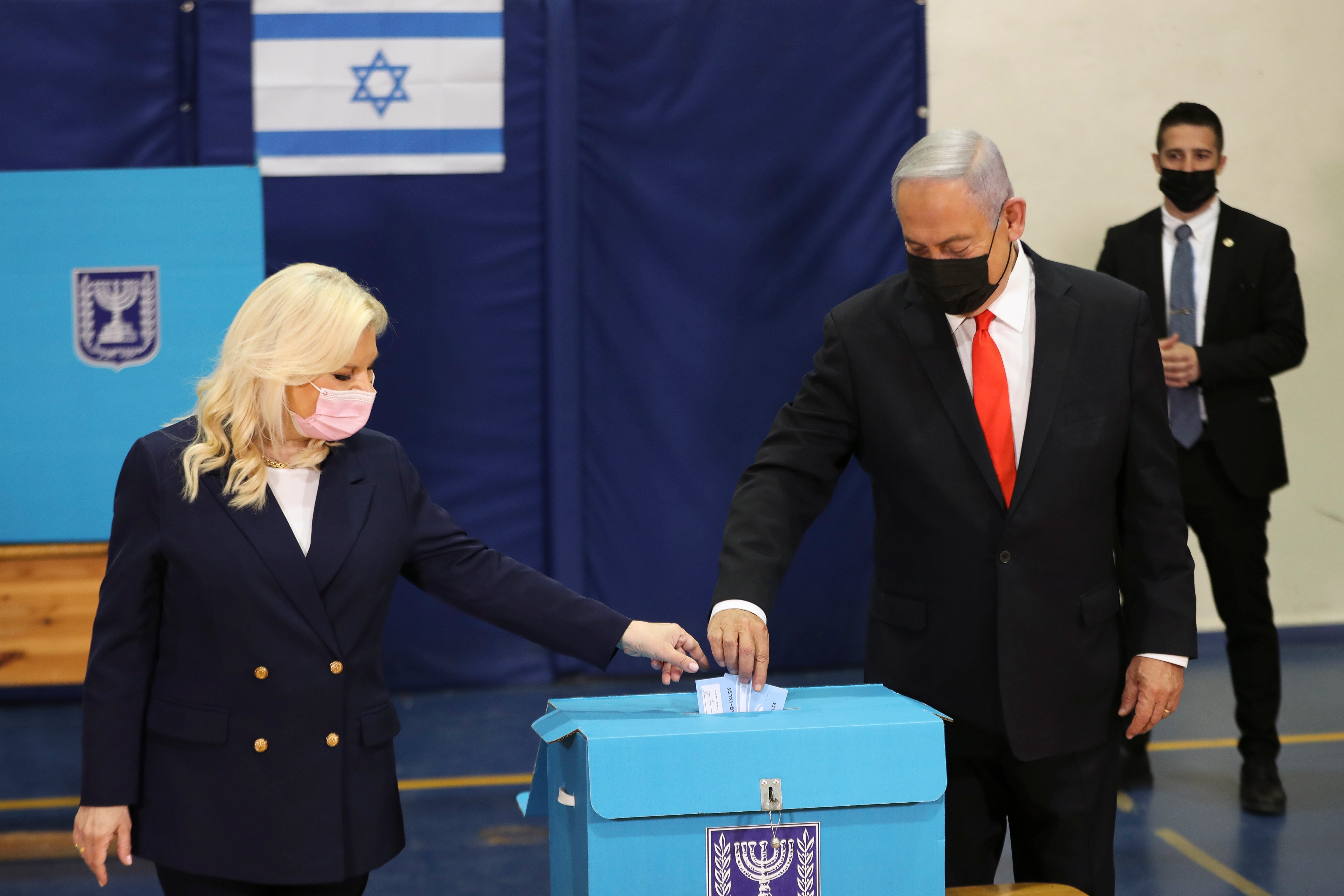 Benjamin Netanyahu and his wife Sara cast their ballots.