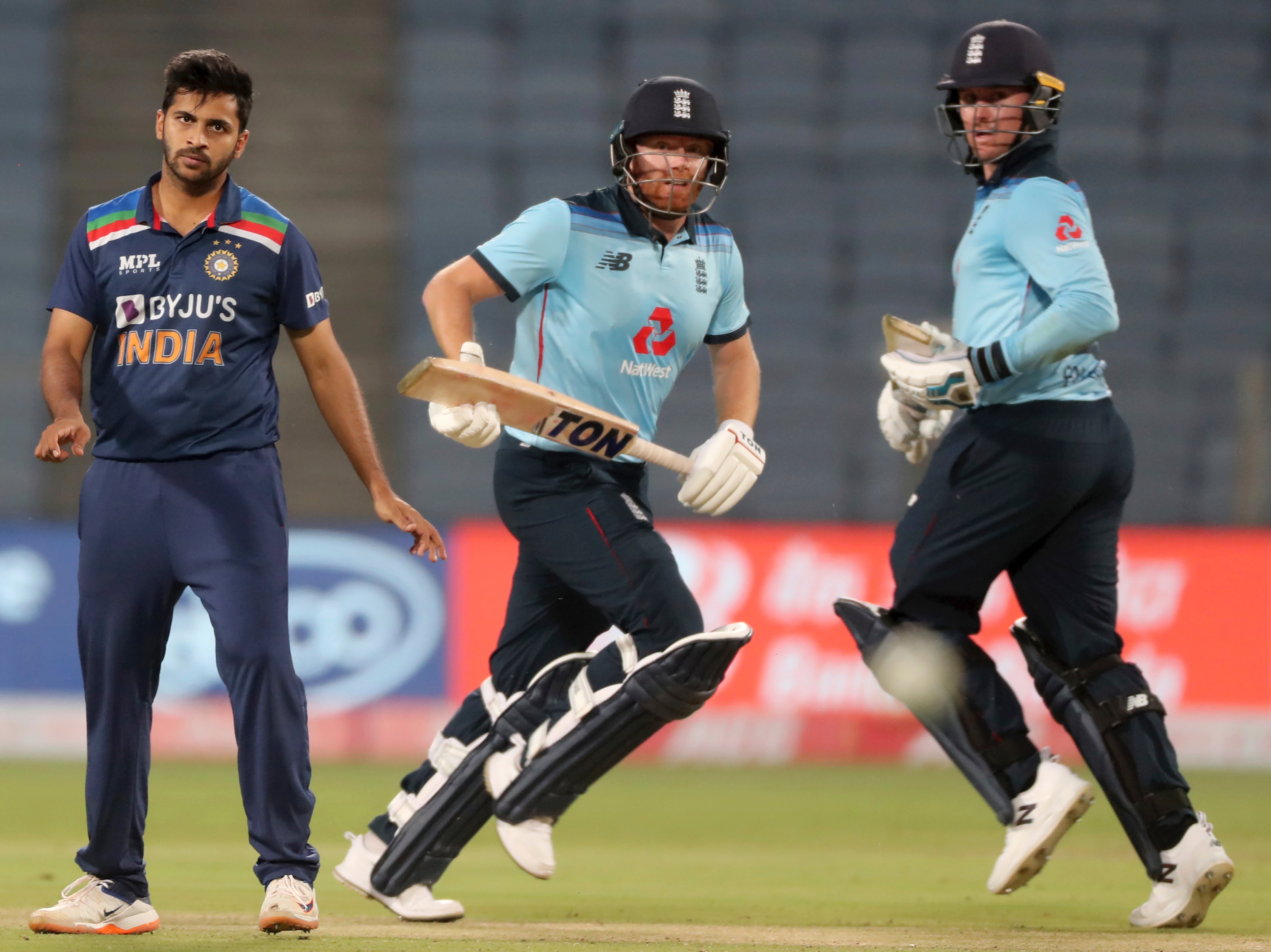 India’s Shardul Thakur watches as England’s Jonny Bairstow and Jason Roy run between the wickets