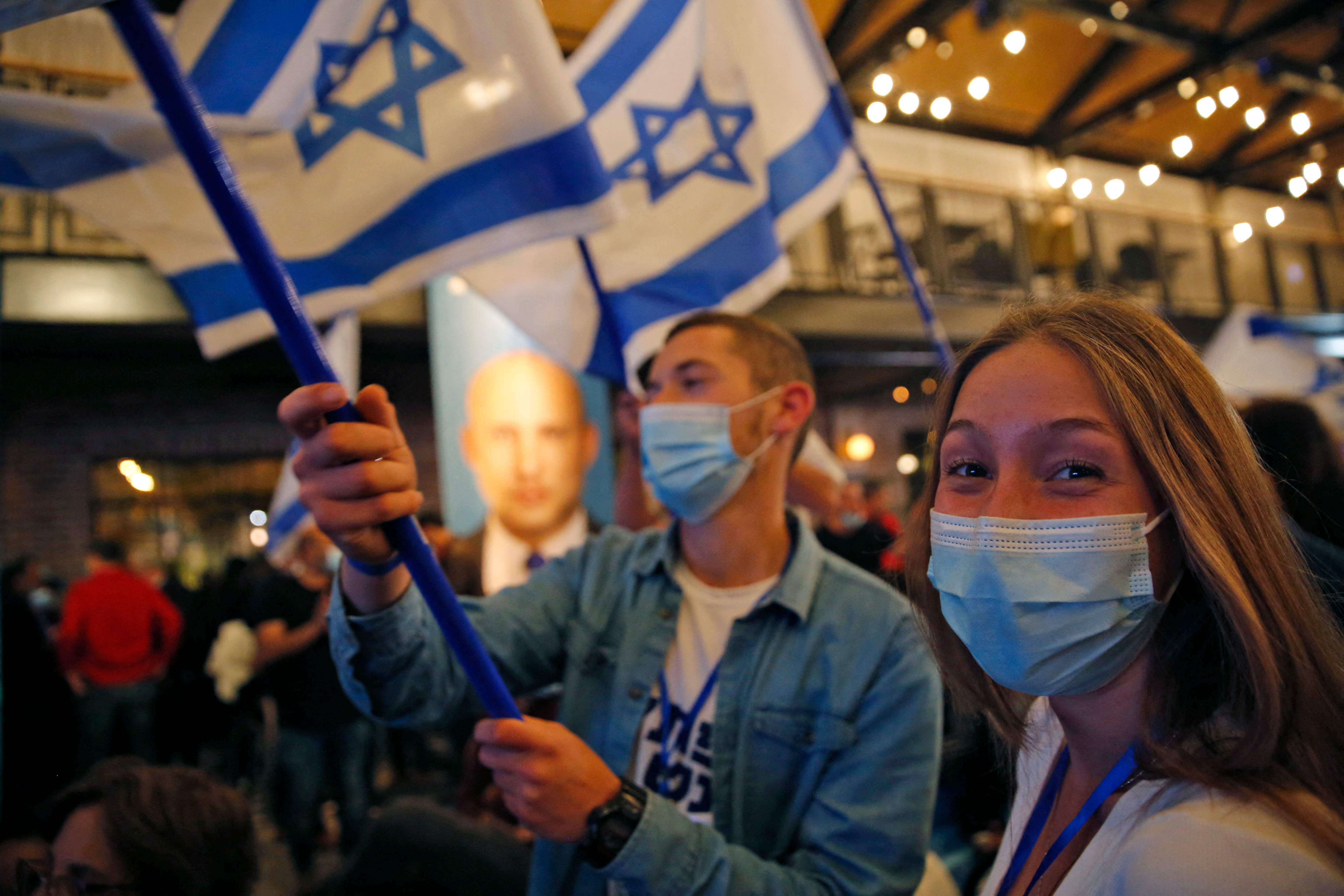 Supporters of the Yamina (‘New Right’) party await election results