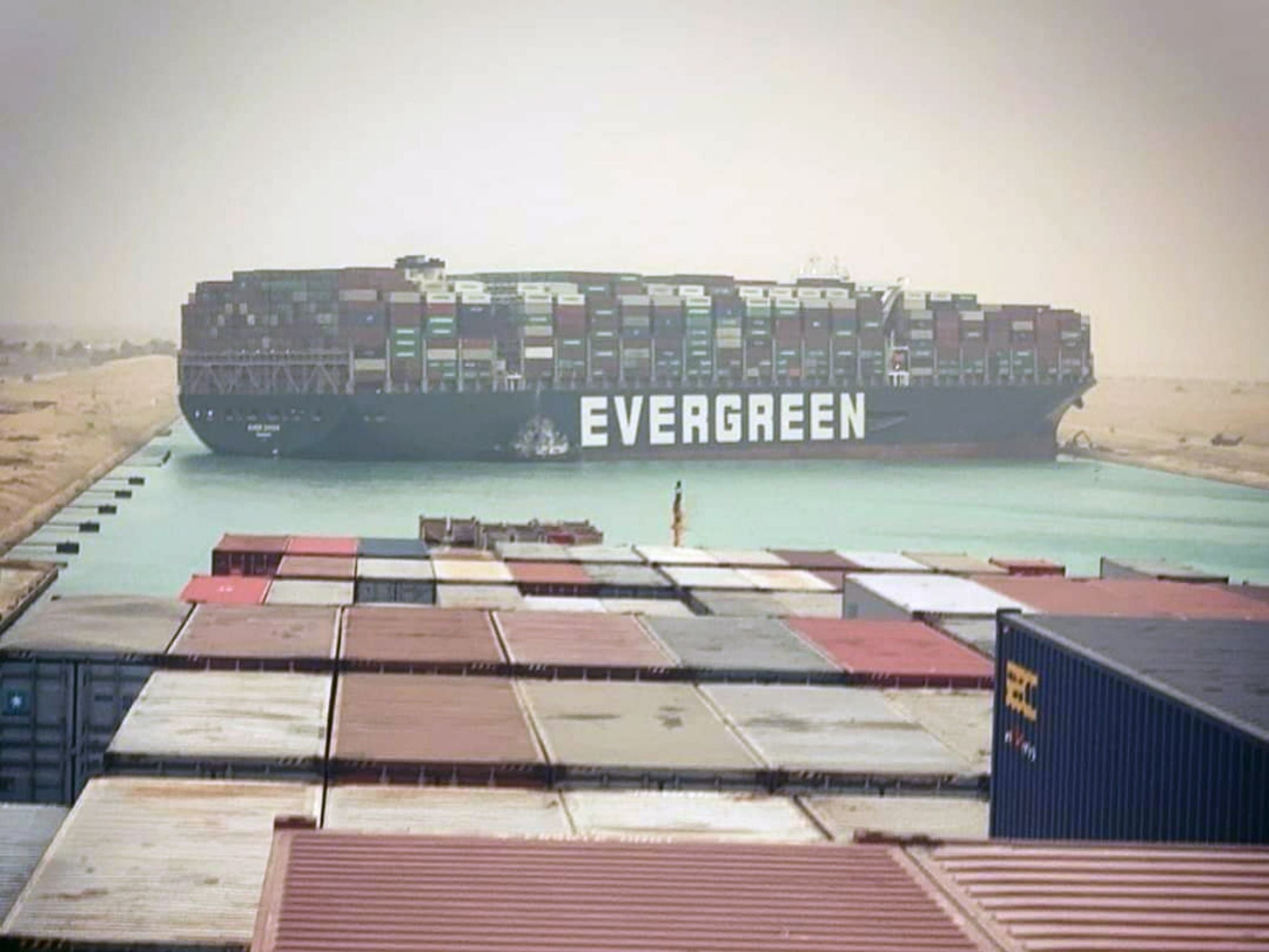 QAnon peddles latest conspiracy theory beyond parody linking Hillary Clinton to Suez ship