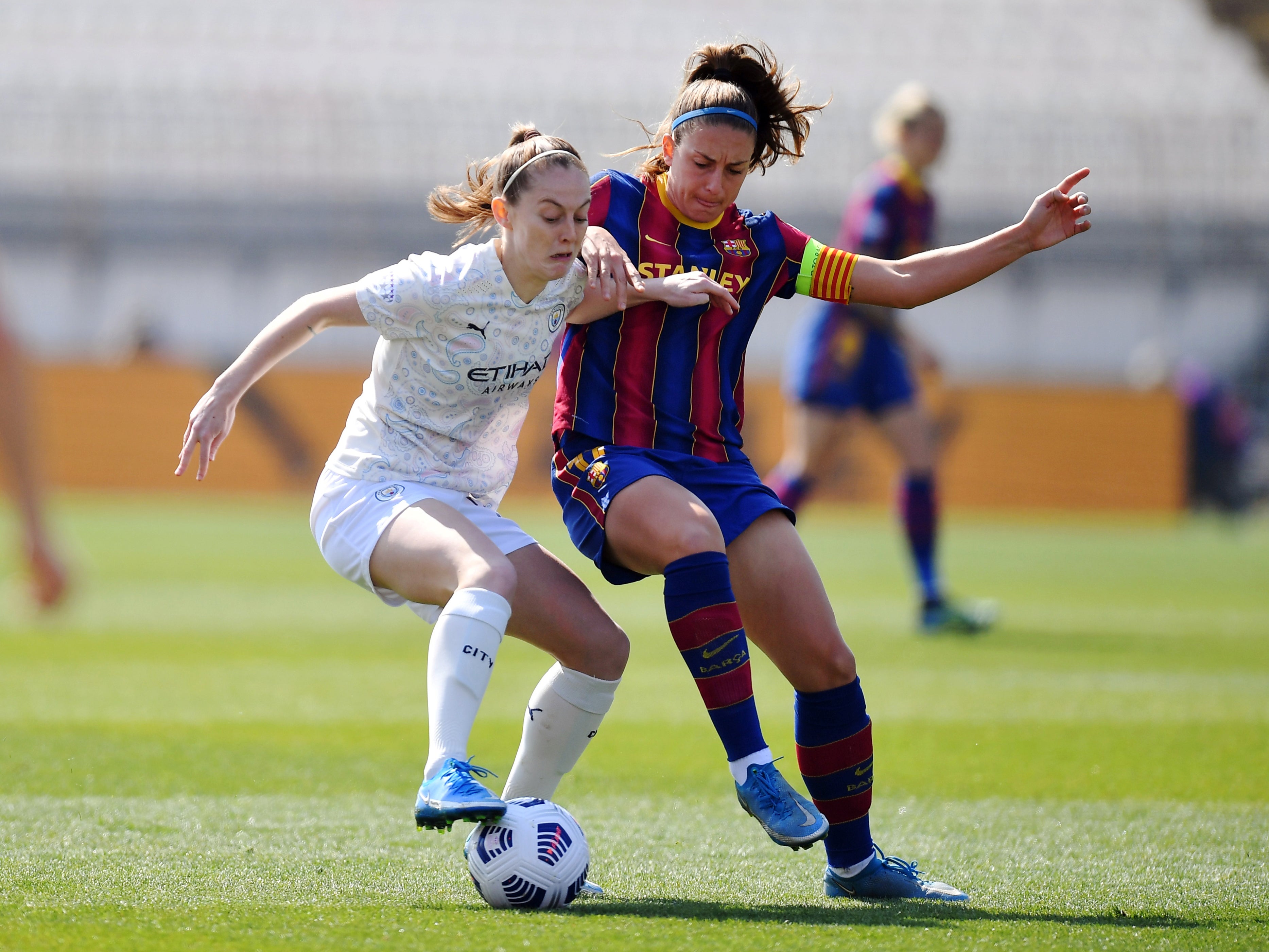 Manchester City's Keira Walsh in action with Barcelona's Alexia Putellas