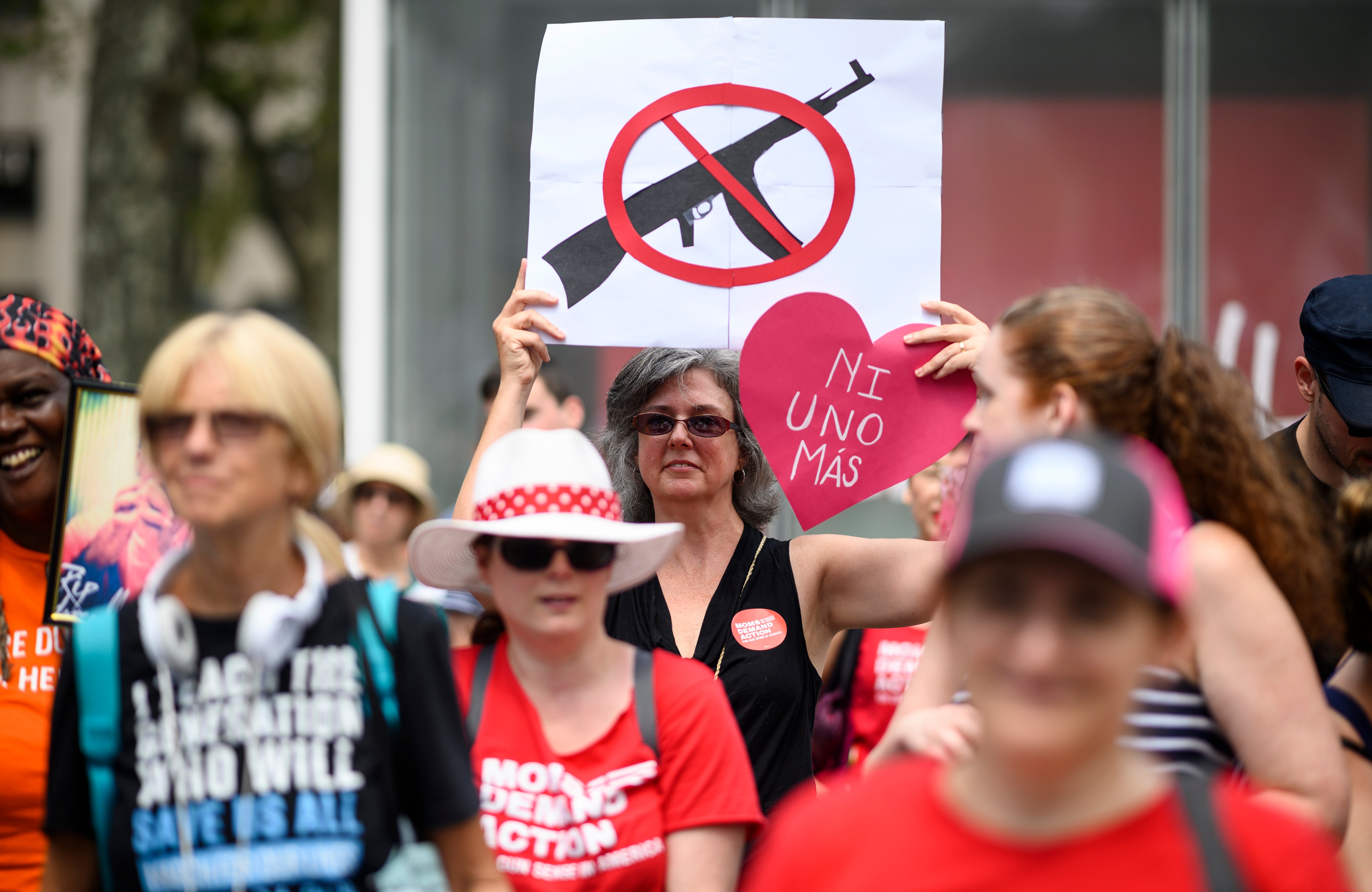 Protestors take part in a rally of Moms against gun violence and calling for Federal Background Checks on 18 August 2019 in New York City