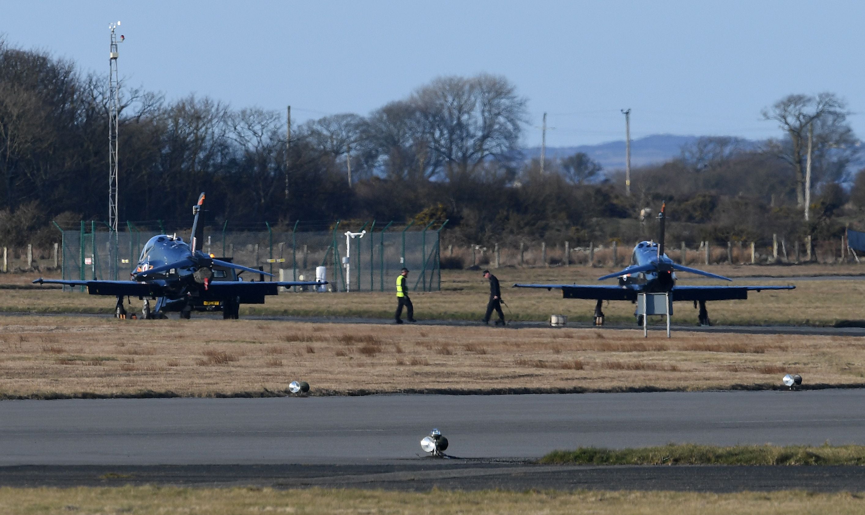 British Royal Air Force (RAF) Hawk jets sit on the tarmac at RAF Mona air base in Anglesey