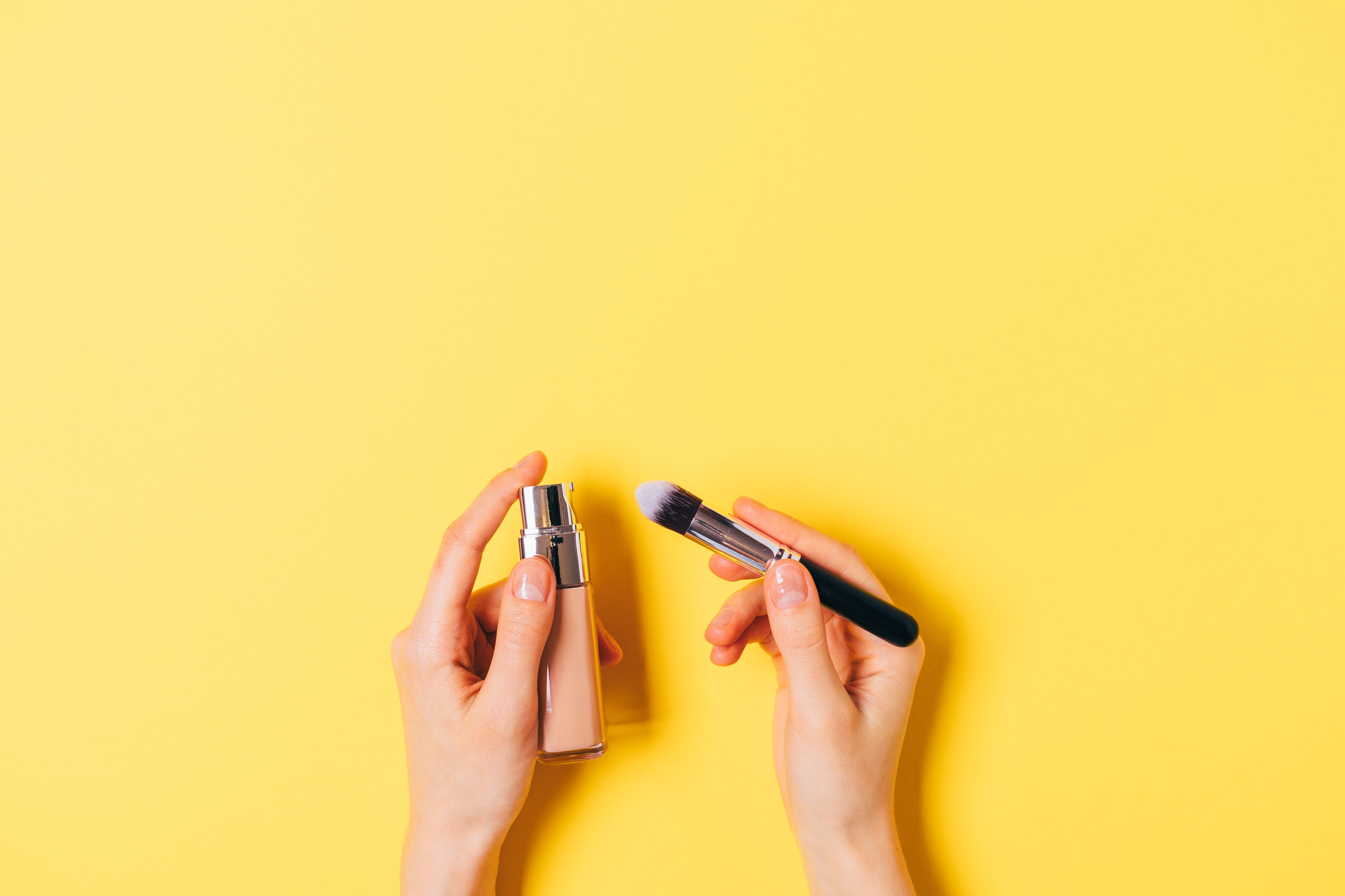 Woman applying foundation