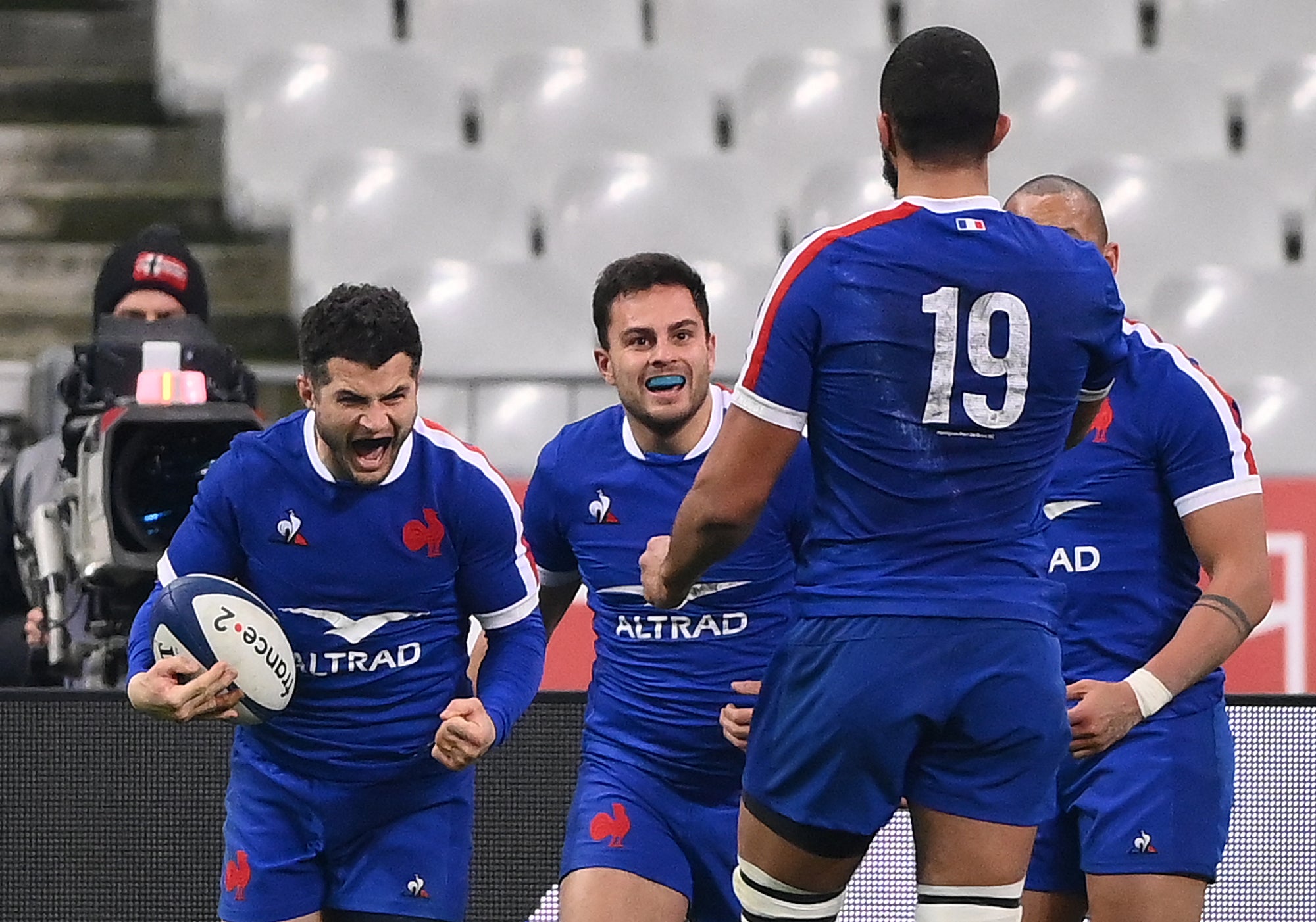 Brice Dullin celebrates after scoring a late try to deny Wales