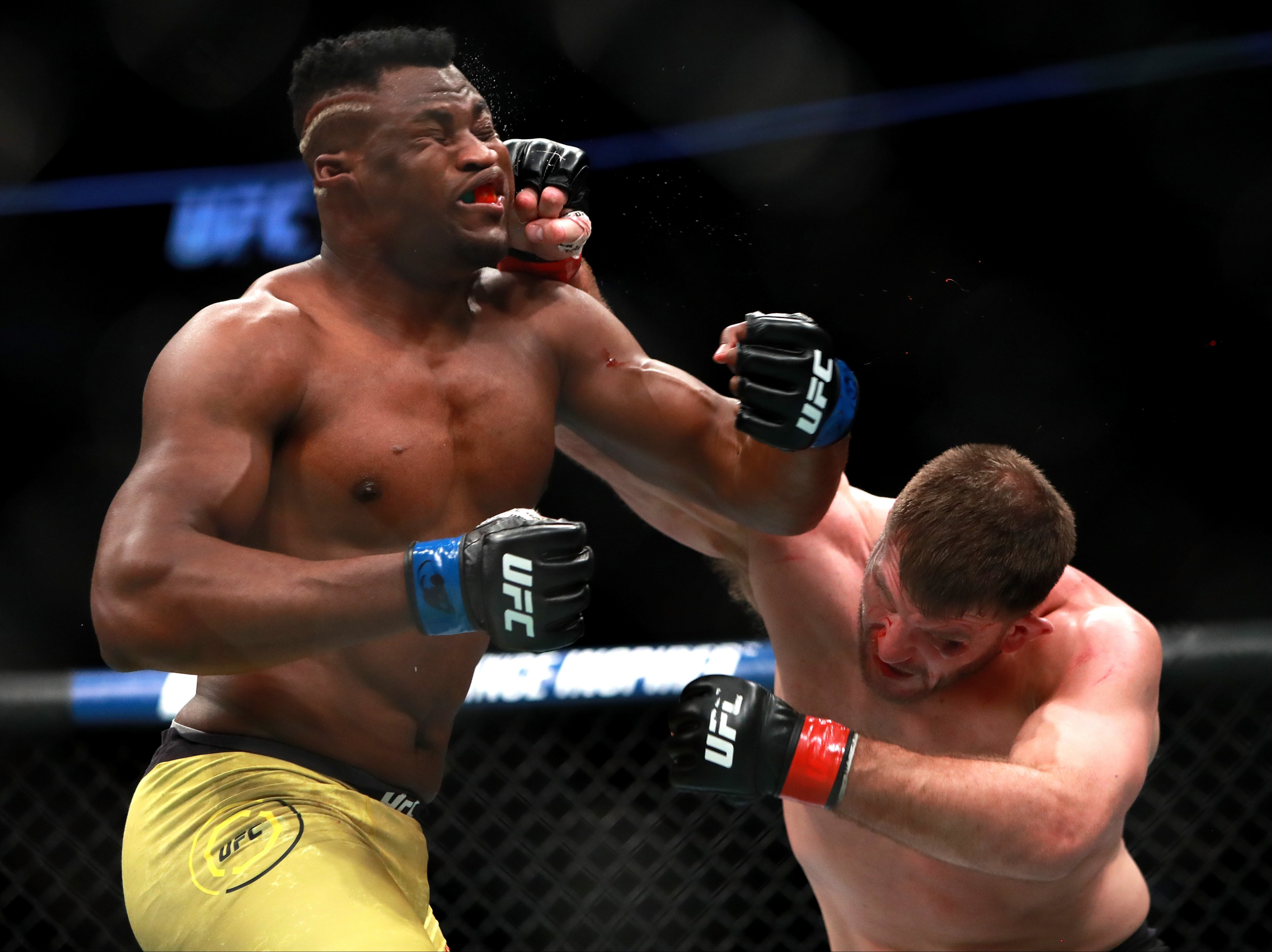 Francis Ngannou (left) during his 2018 loss to Stipe Miocic