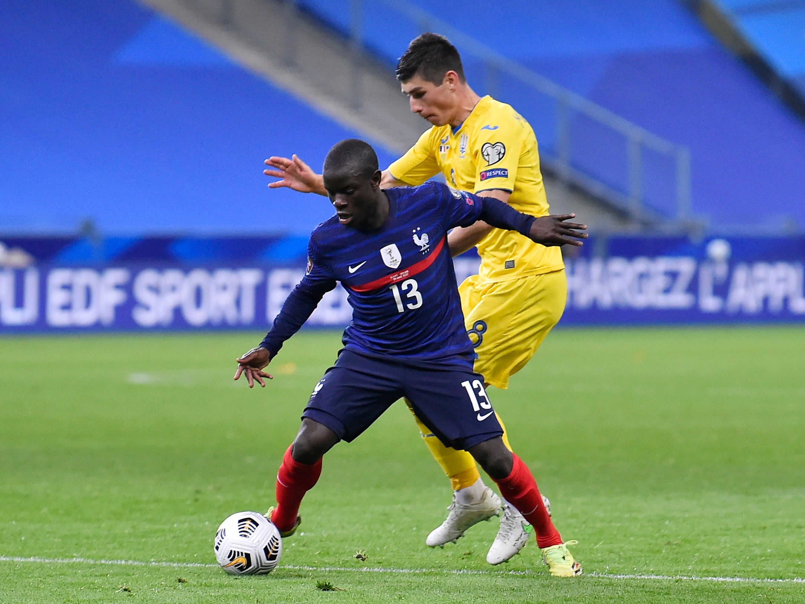 N'Golo Kante of France is challenged by Ruslan Malinovskiy of Ukraine