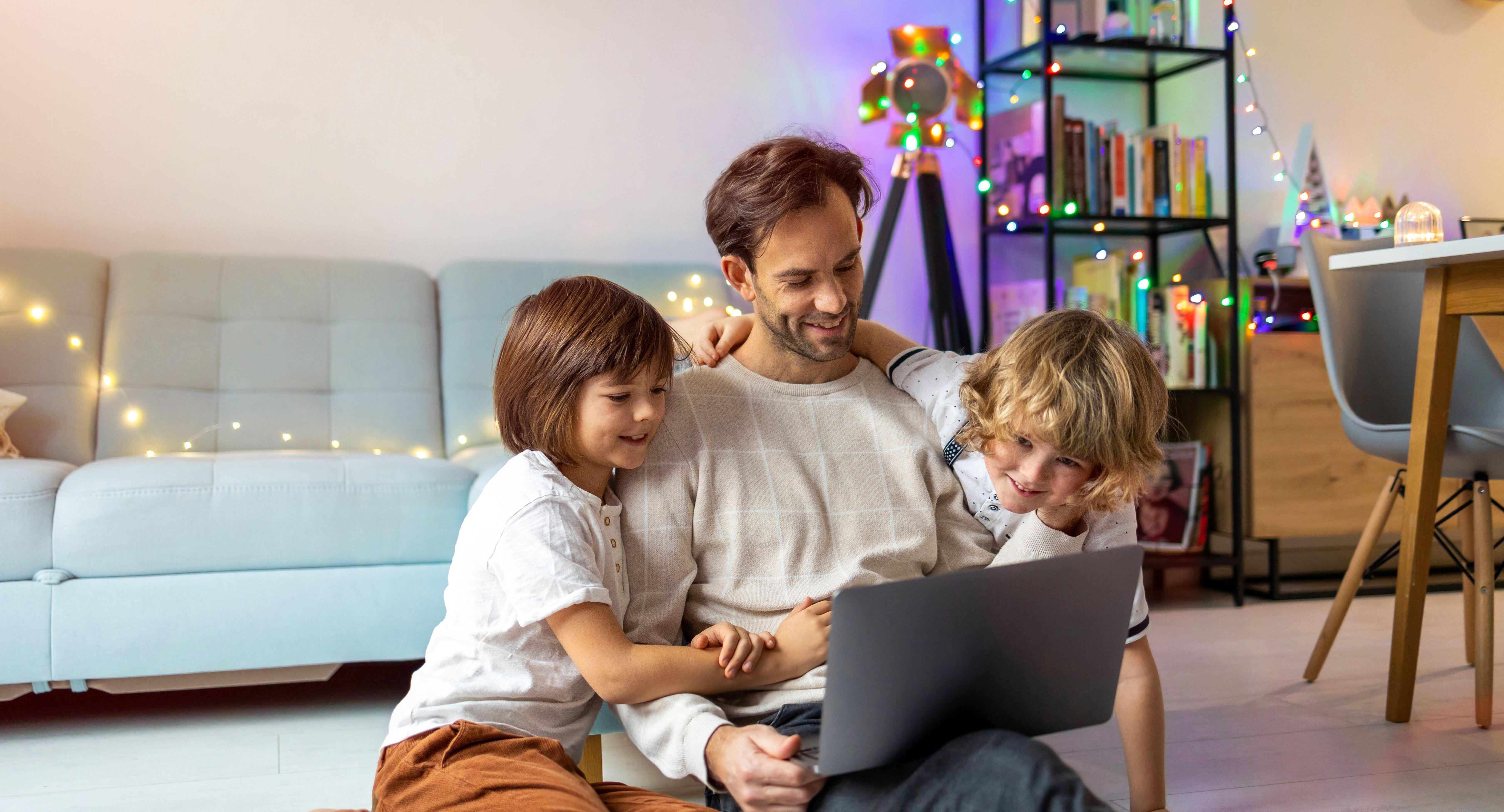 Father trying to work from home with his kids