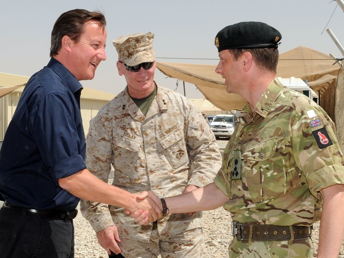 Nick Welch (right) welcoming the then prime minister David Cameron to Camp Leatherneck in Afghanistan’s Helmand Province for 4 July celebrations in 2011