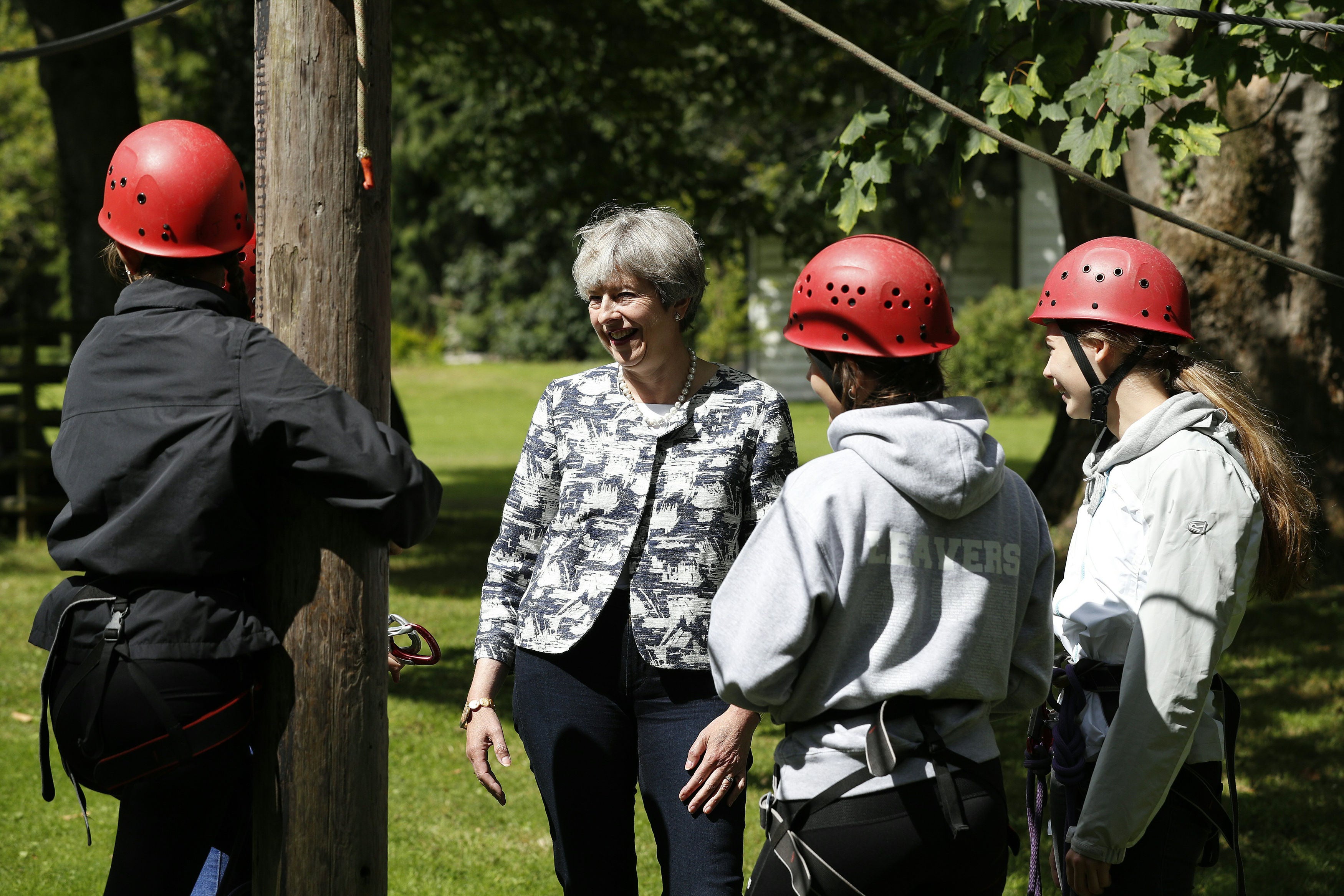 Theresa May helps unveil a new NCS course as prime minister in 2017