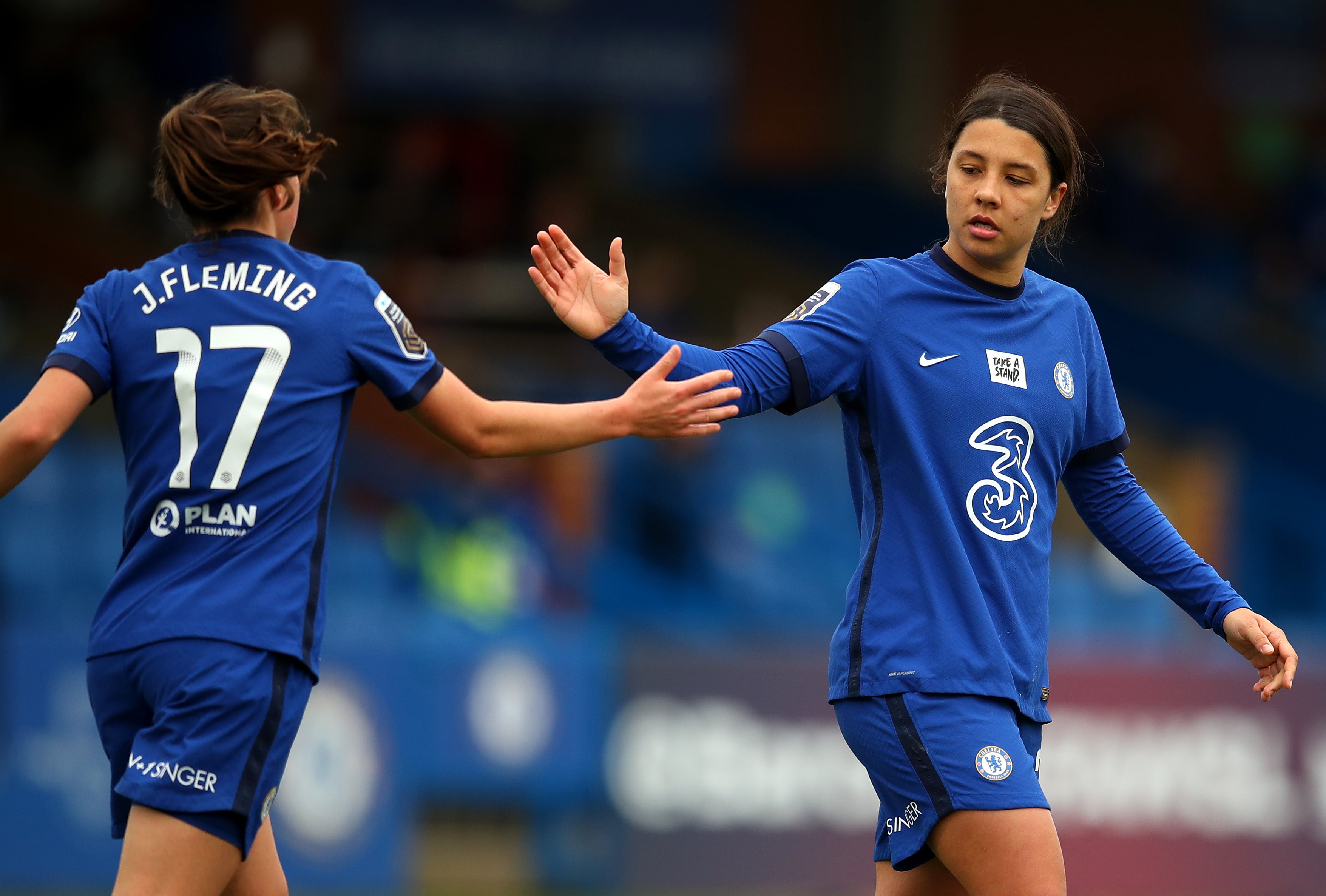 Chelsea forward Sam Kerr celebrates with team-mate Jessie Fleming