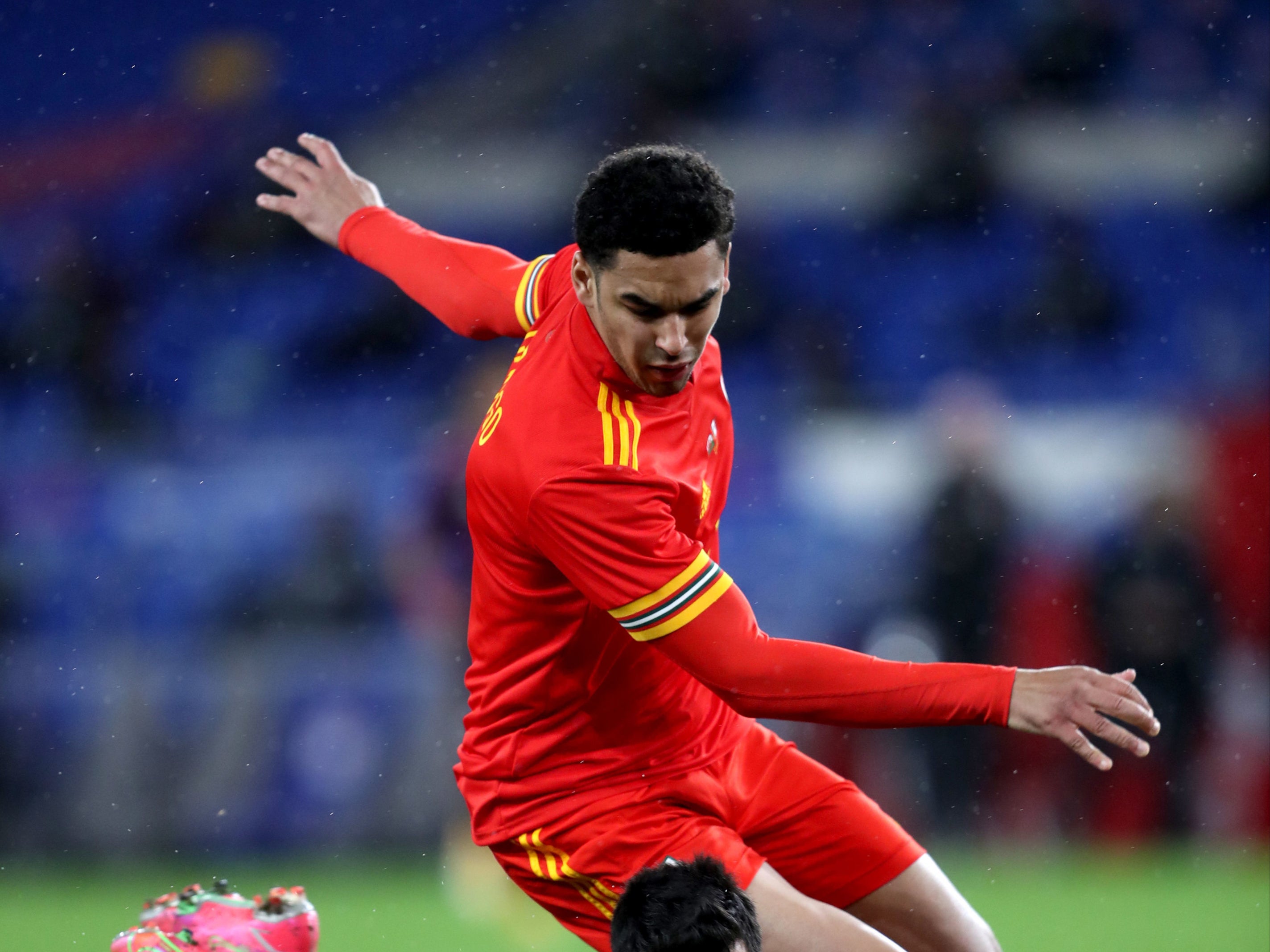 Wales’ Ben Cabango battles for the ball during an international friendly at Cardiff City Stadium