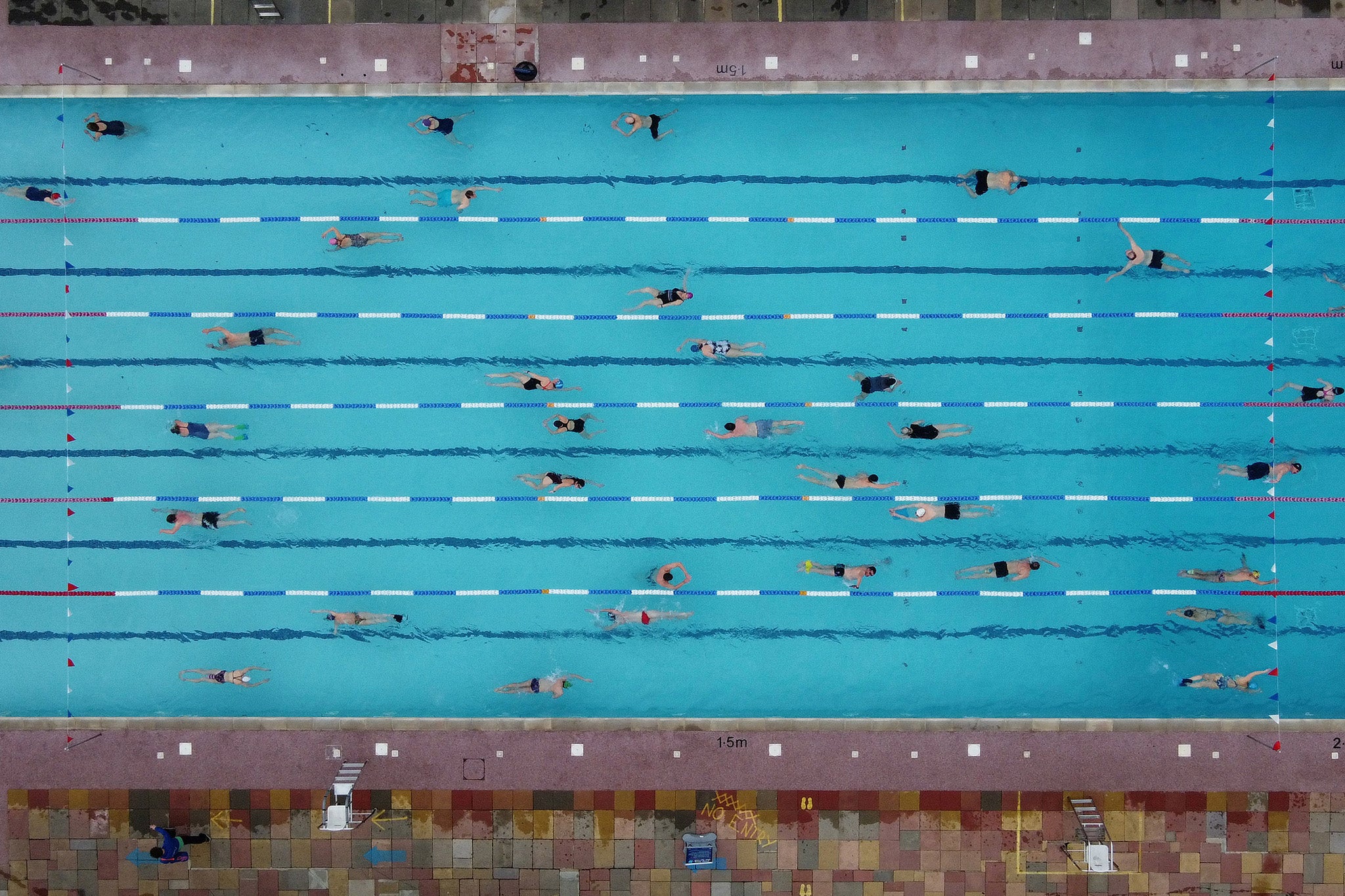 Swimmers take to Hampton lido as pools reopen