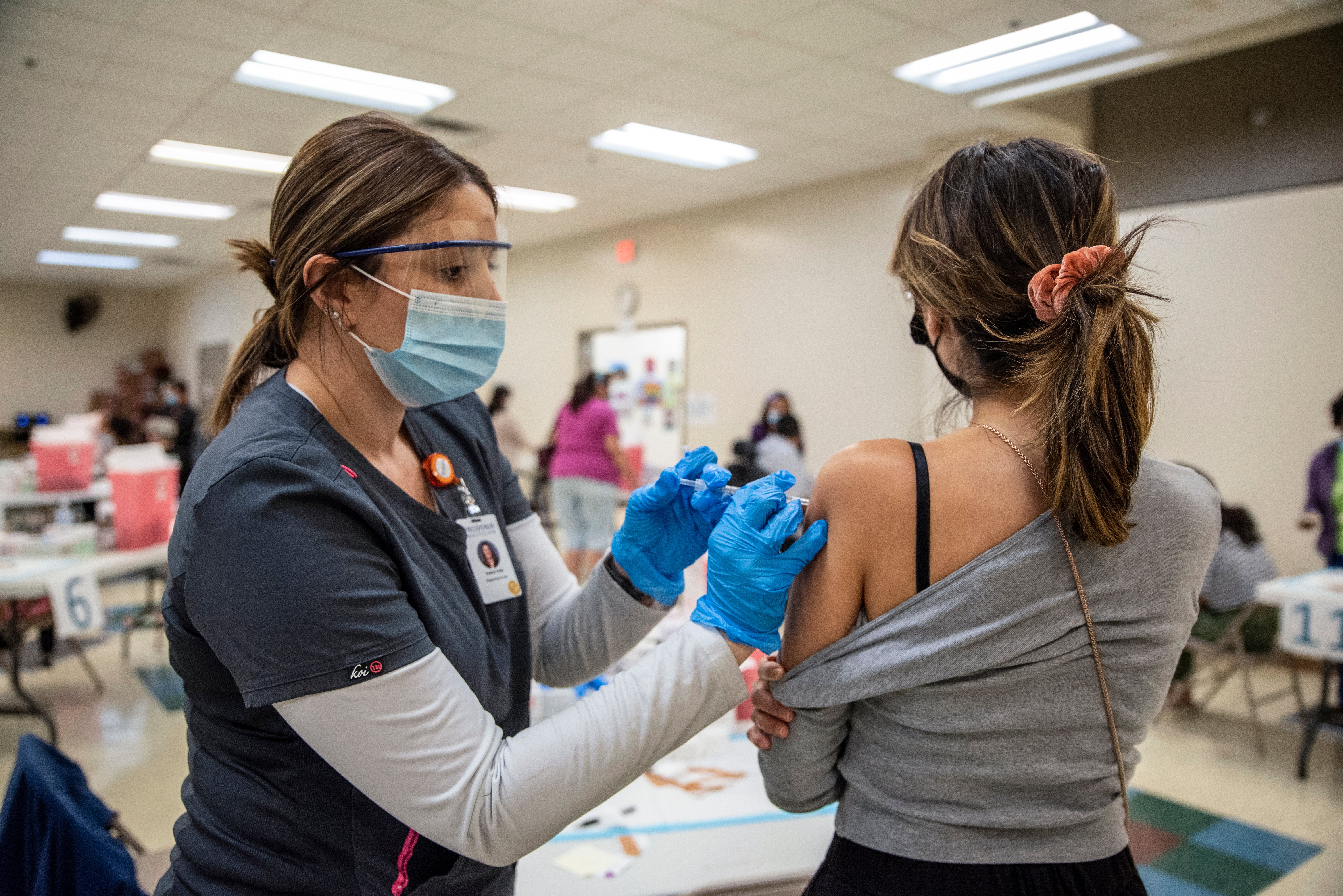 A woman getting a dose of the Moderna coroanvirus vaccine, which are available at many Target stores in the US