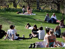 Coronavirus news – live: Police ban alcohol as crowds flock to Nottingham parks on hottest March day since ‘68