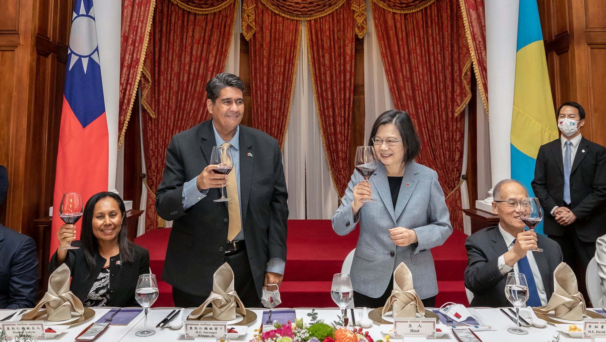 In this photo released by the Taiwan Presidential Office, Palau President Surangel Whipps, center left, toasts with Taiwan President Tsai Ing-wen during a banquet in Taipei, Taiwan on Tuesday, 30 March 2021