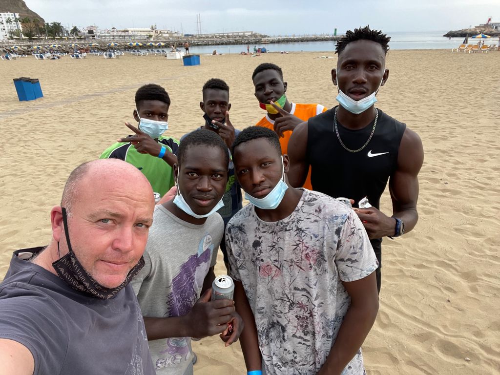 Calvin Lucock (left) with some of those who have managed to get to the Canary Islands