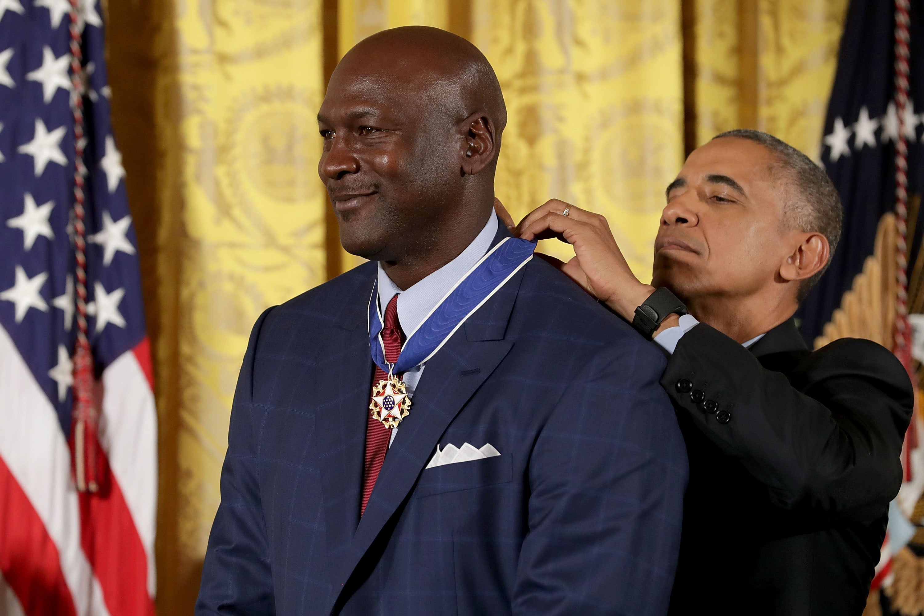 Barack Obama awards the Presidential Medal of Freedom to Michael Jordan during a ceremony in the White House on 22 November, 2016