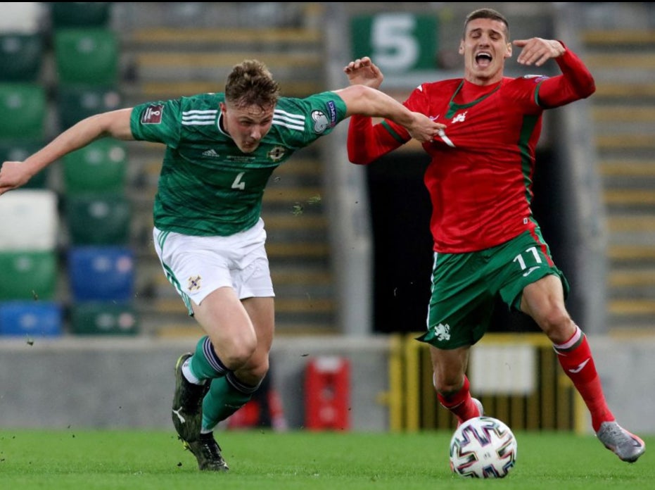 Danny Ballard vies with Bulgaria striker Kiril Despodov