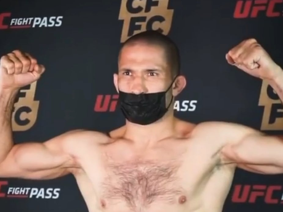 Khetag Pliev weighs in ahead of the bout in which he had his finger torn off