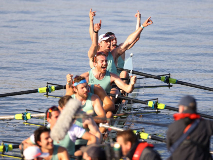 Cambridge celebrate winning the men’s race