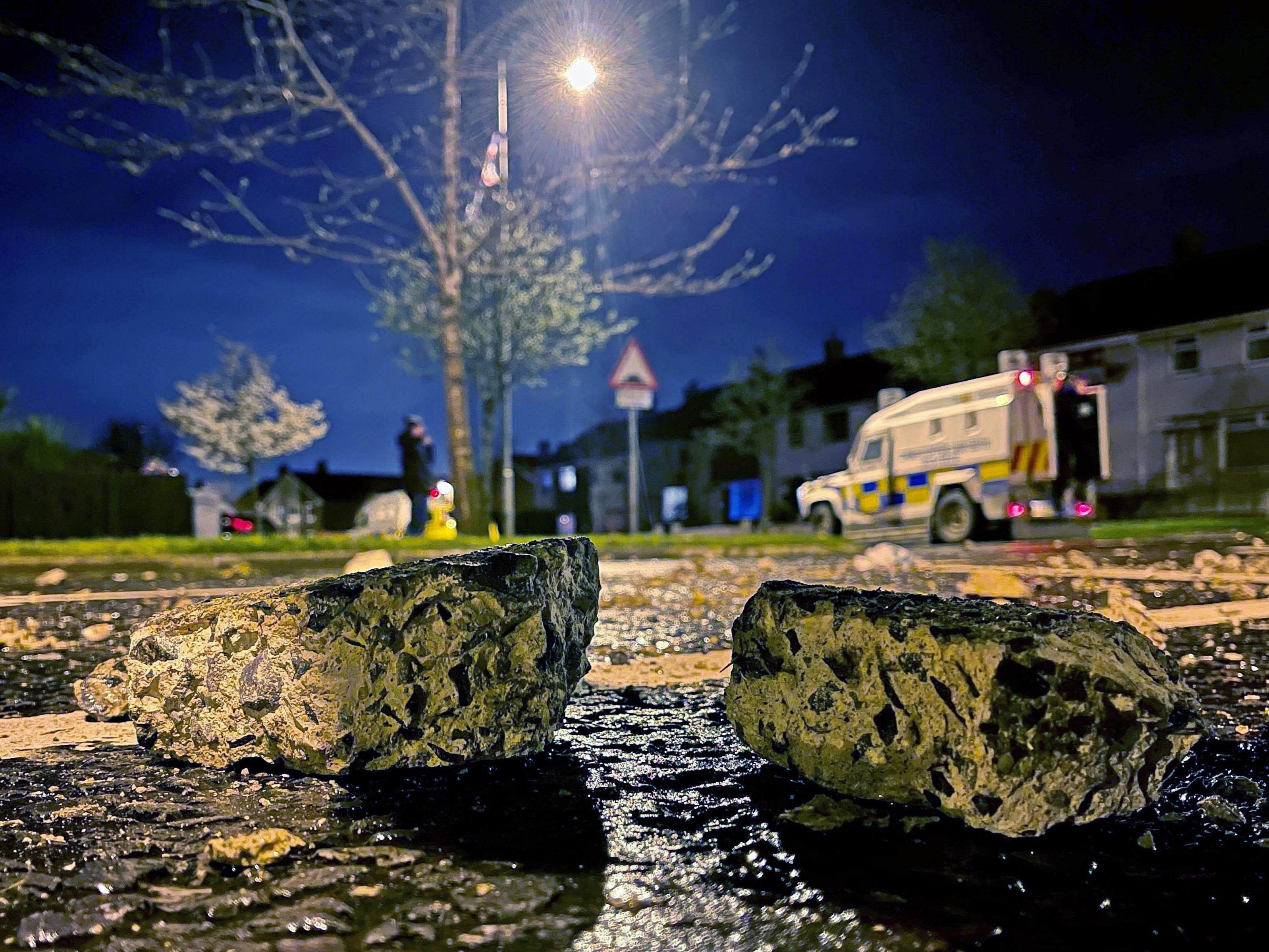 Pieces of a wall that were thrown at the PSNI on Northland in Carrickfergus near Belfast following sporadic outbursts of disorder