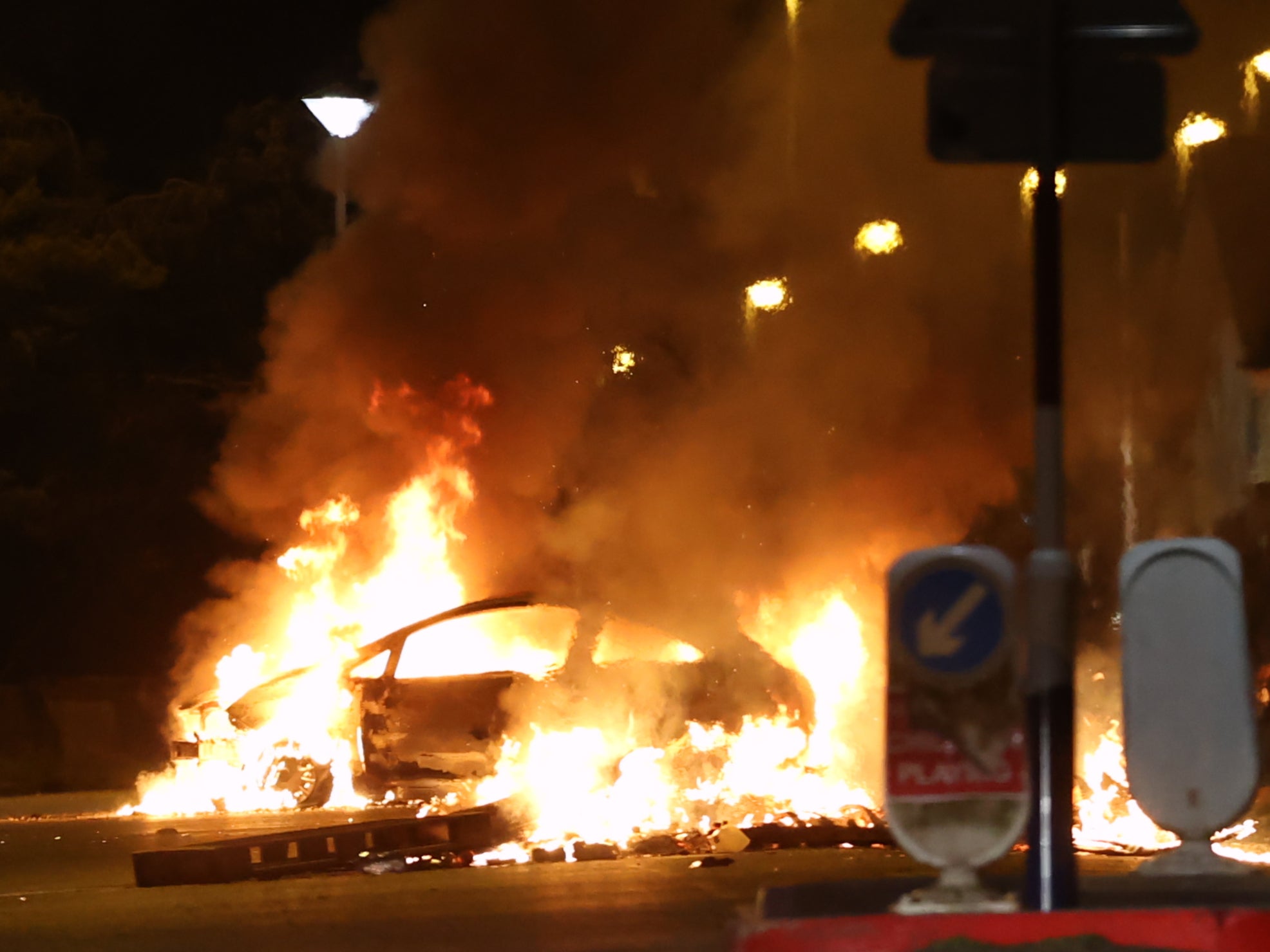 A car burns on Sperrin Park, Waterside, Derry