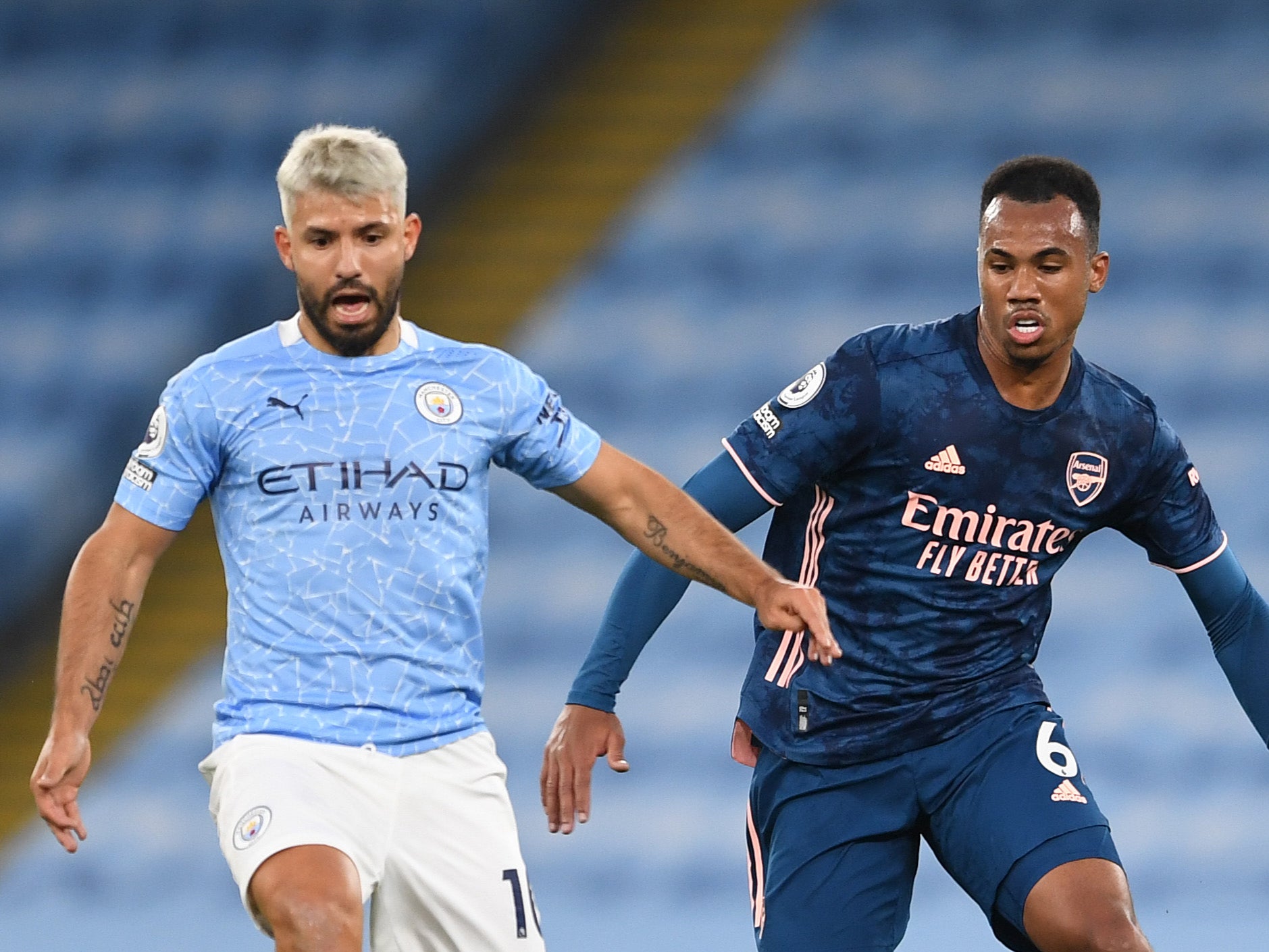 Manchester City striker Sergio (left) in action against Arsenal