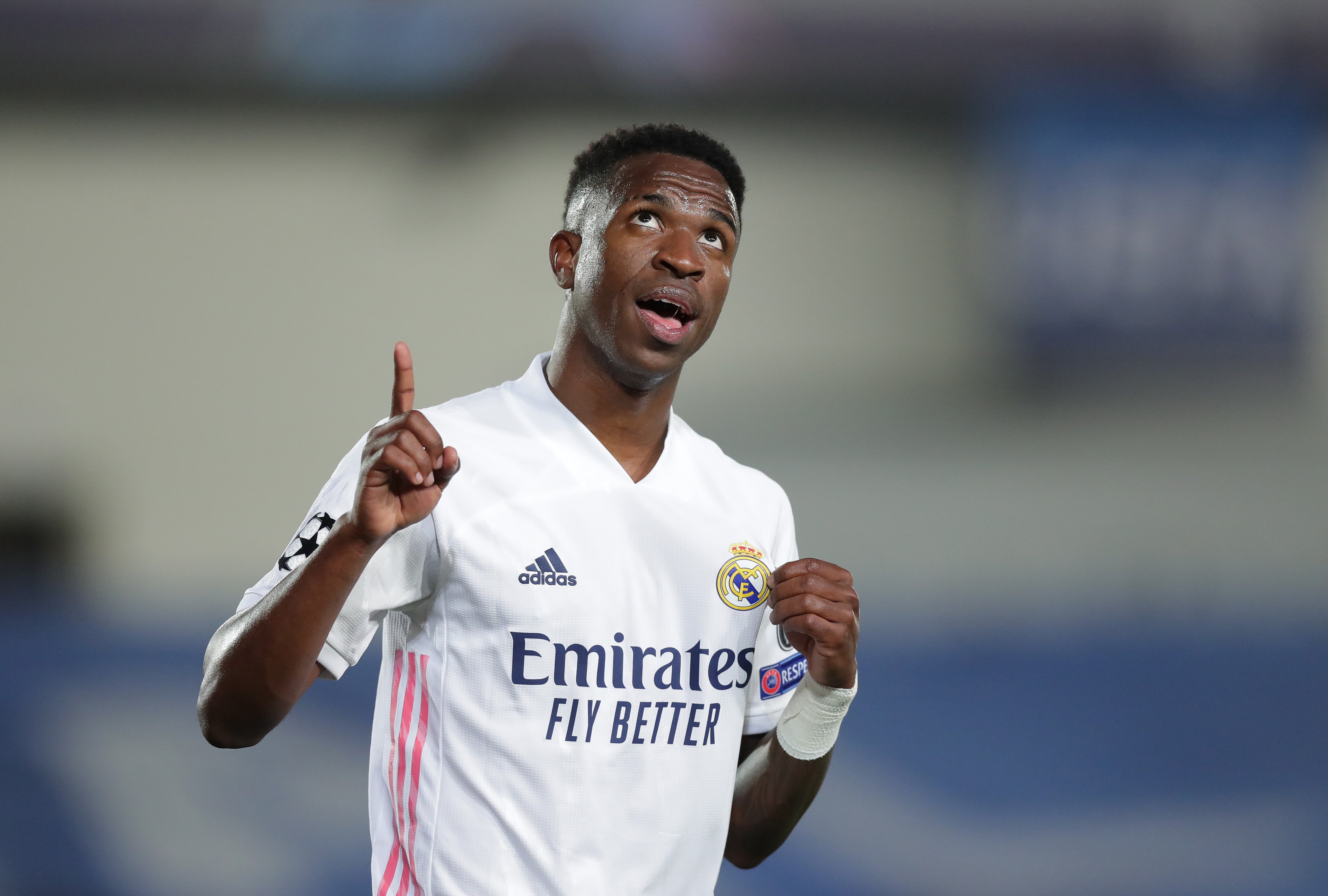 Vinicius Junior celebrates for Real Madrid against Liverpool