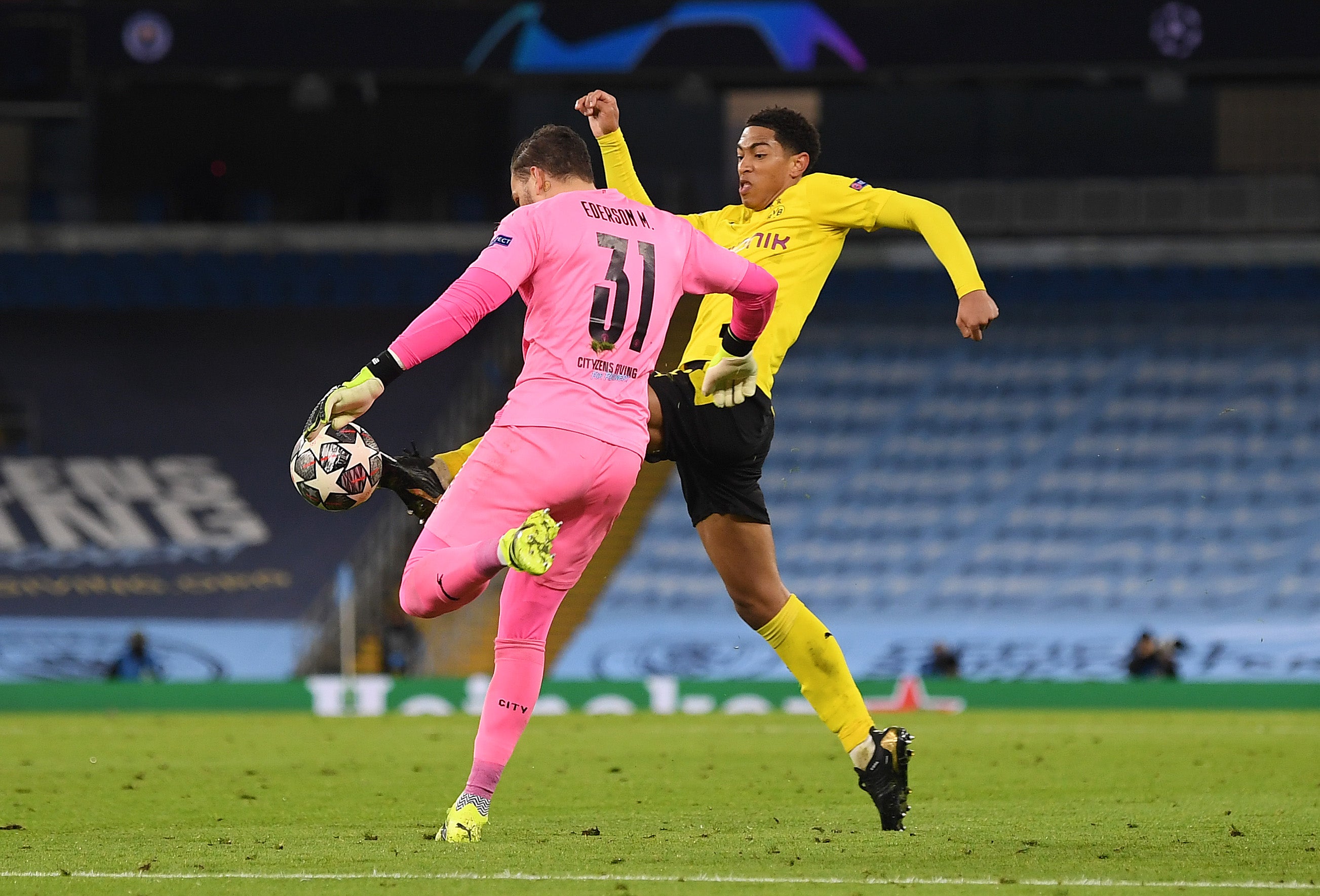 Jude Bellingham nicks the ball off Ederson’s toes before being unfairly penalised