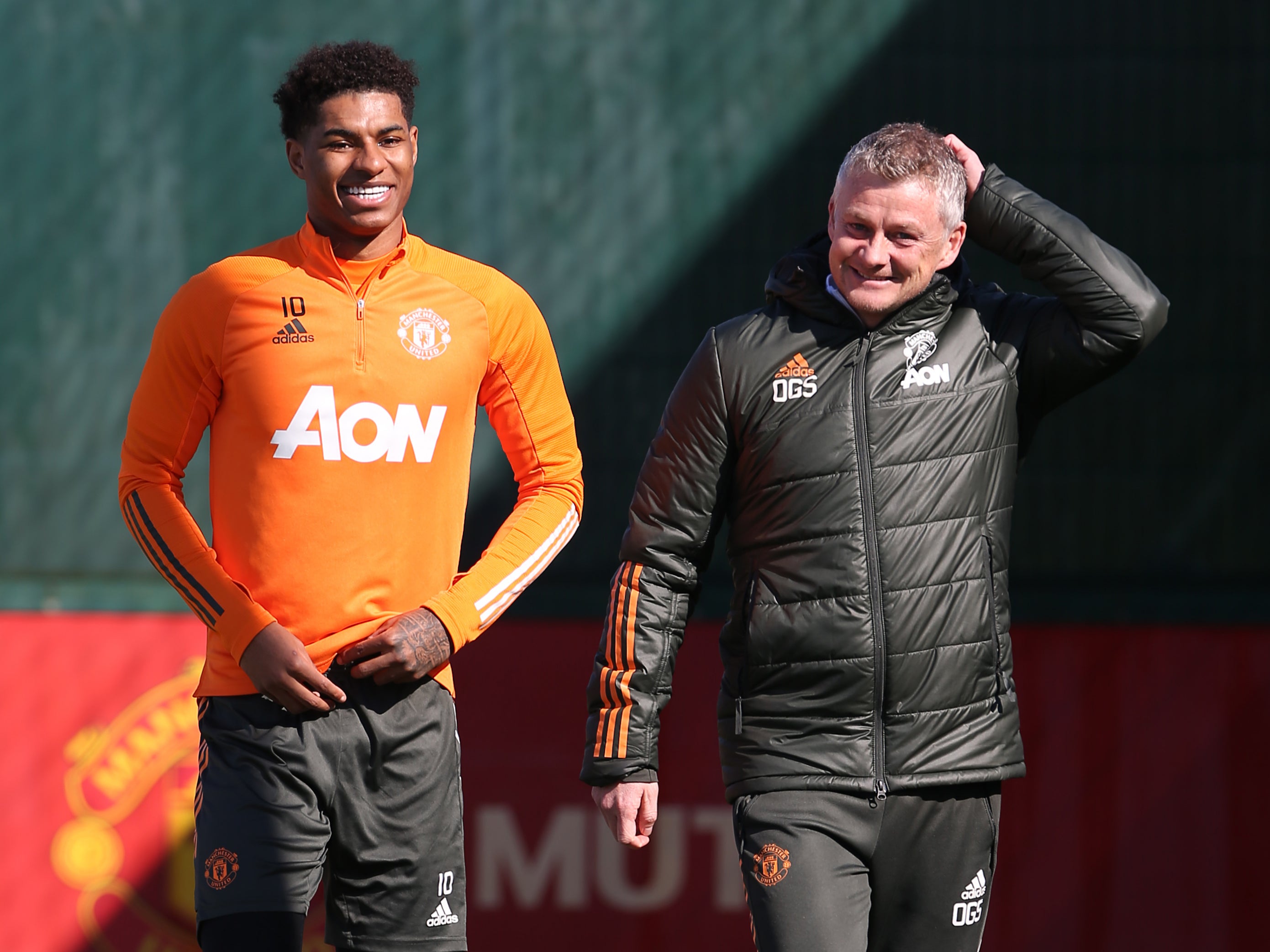 Manchester United forward Marcus Rashford and manager Ole Gunnar Solskjaer