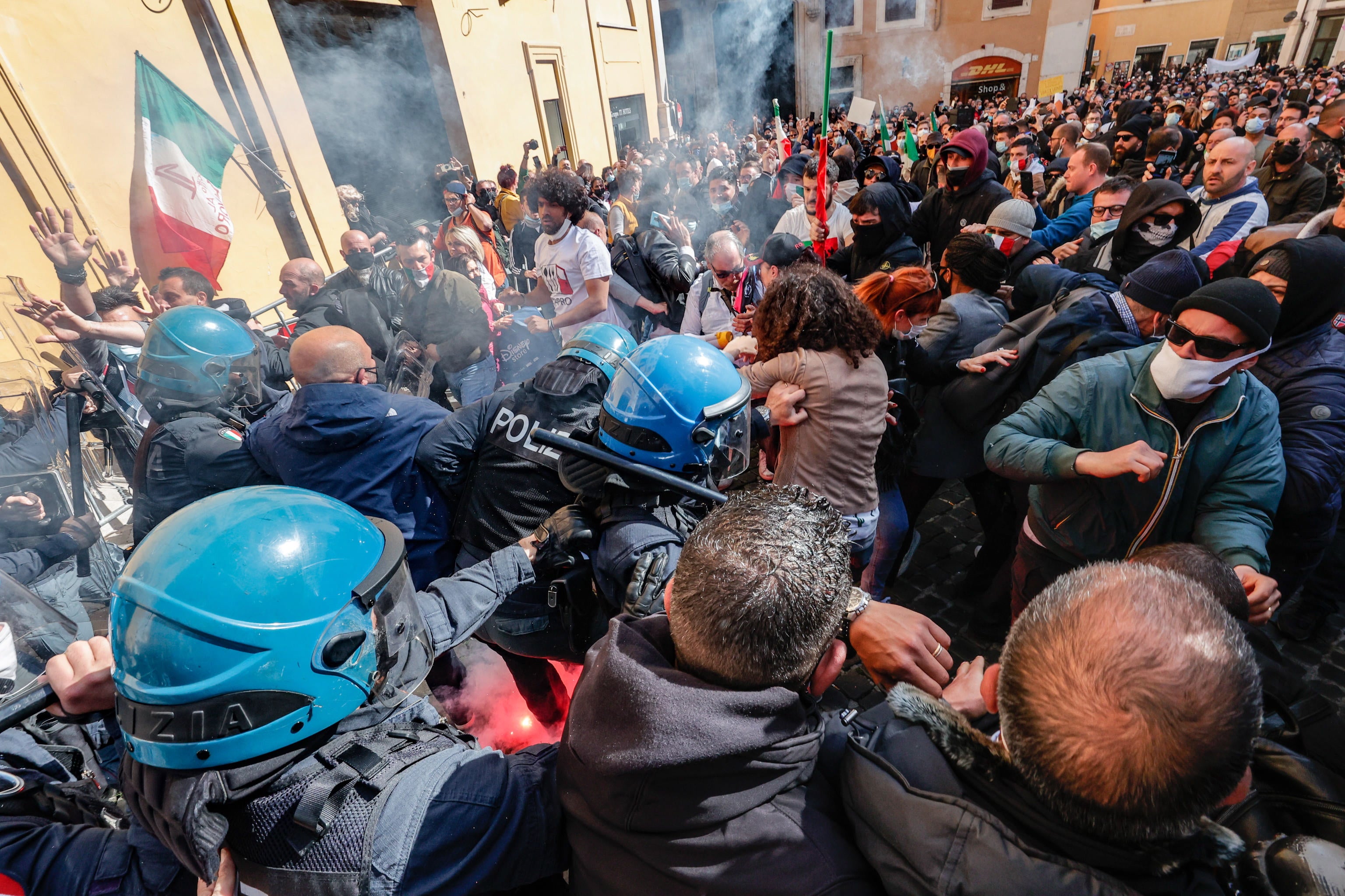 Traders, shopkeepers and restaurateurs clash with police during a protest next to the Chamber of Deputies in Piazza Montecitorio, Rome, Italy, earlier this week